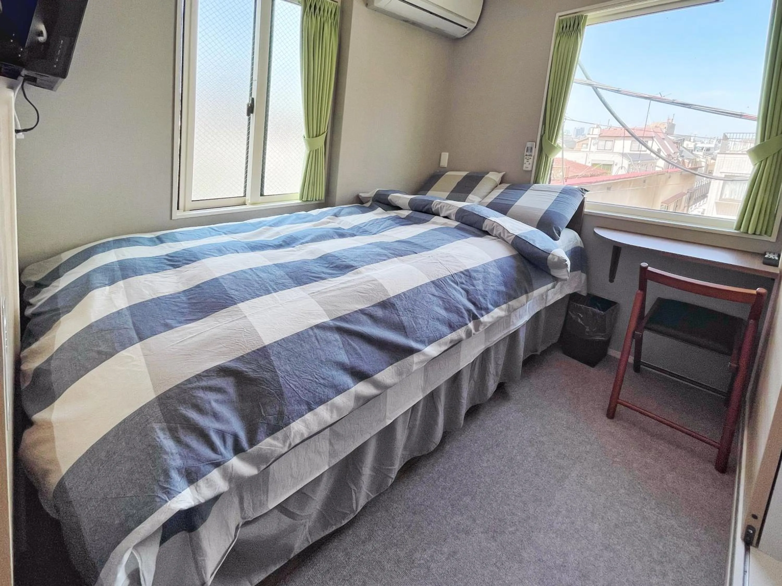 Bed in SHINJUKU WARM HOUSE