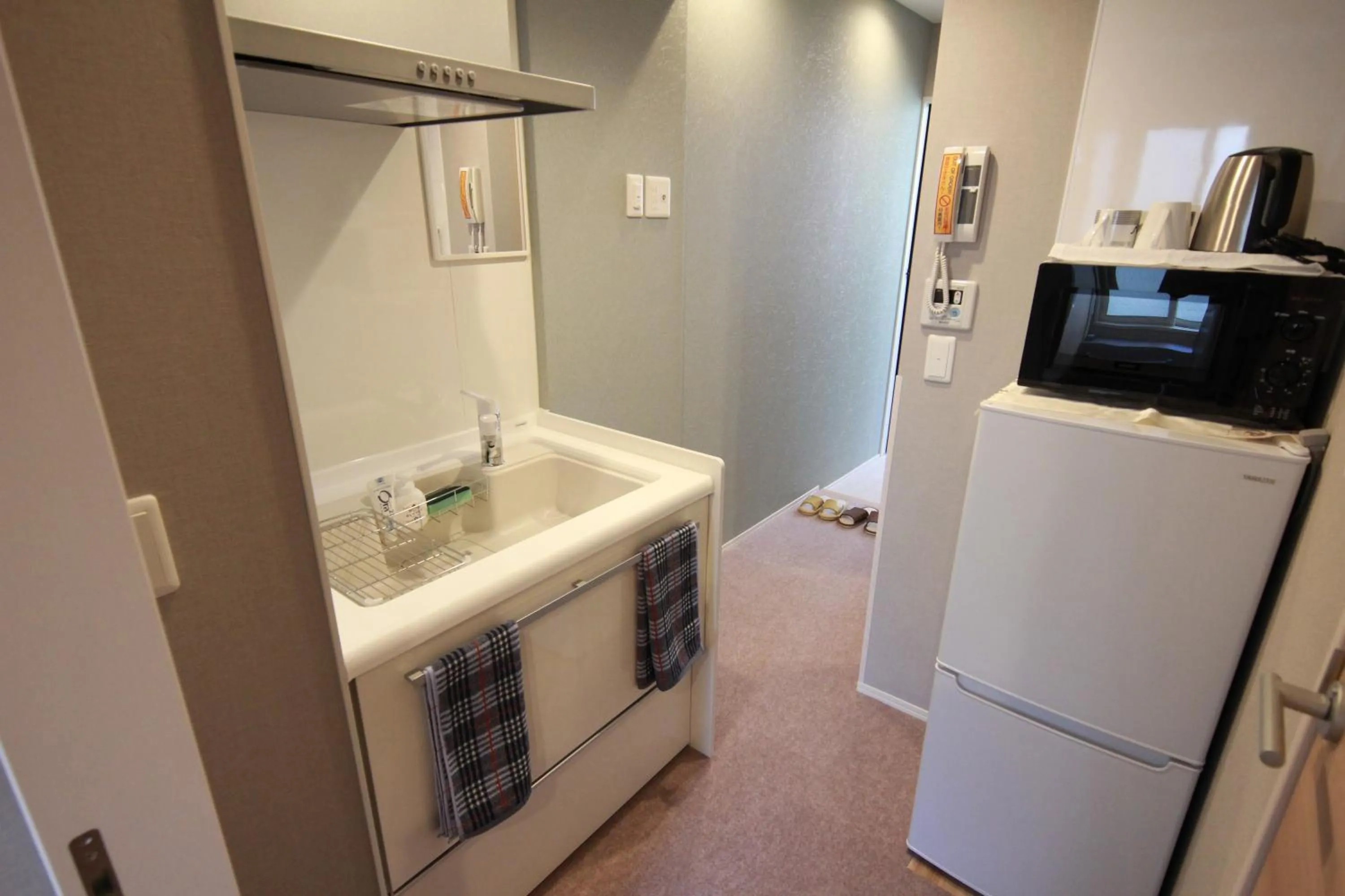 Kitchen or kitchenette in SHINJUKU WARM HOUSE