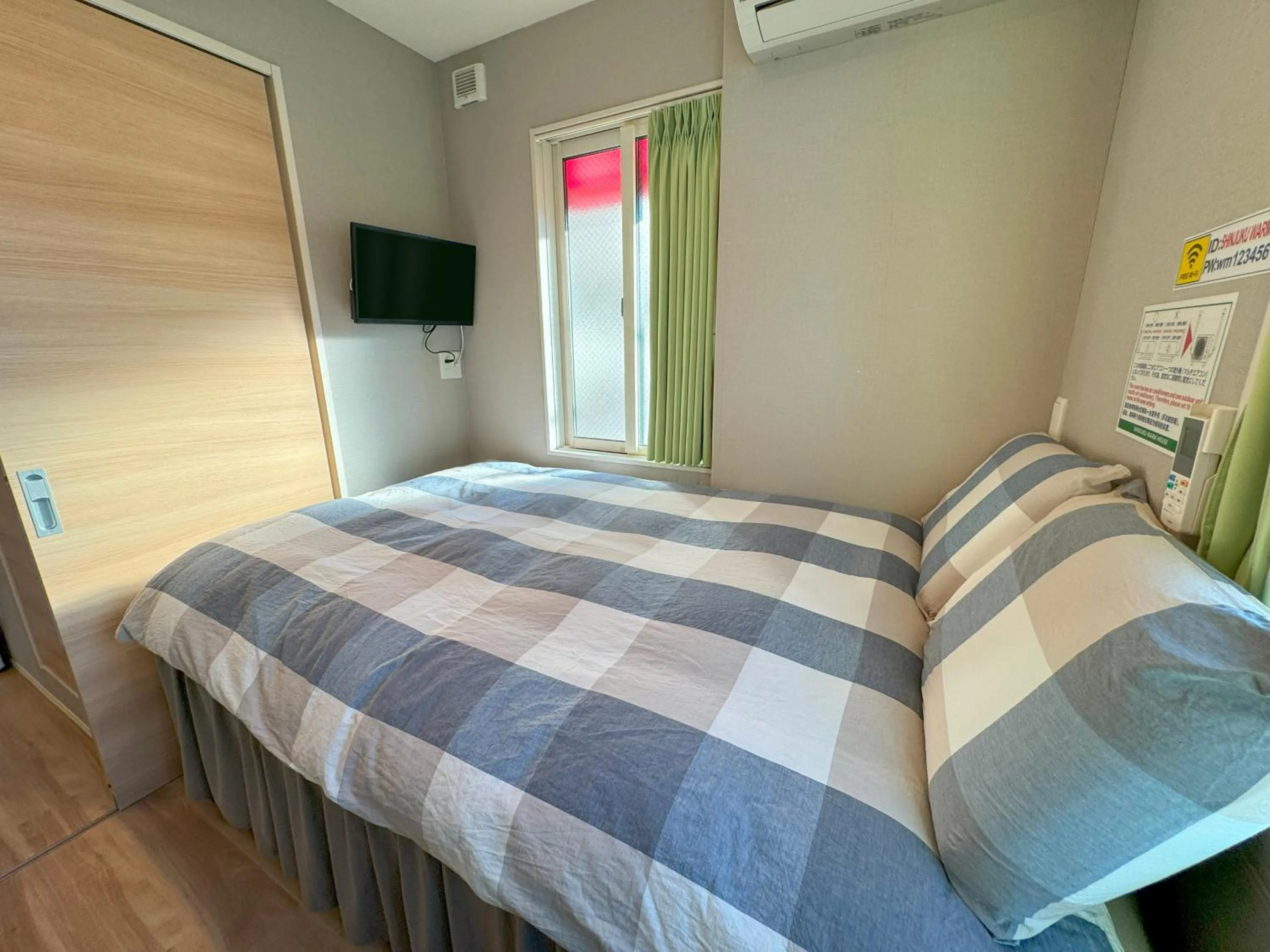 Bed in SHINJUKU WARM HOUSE