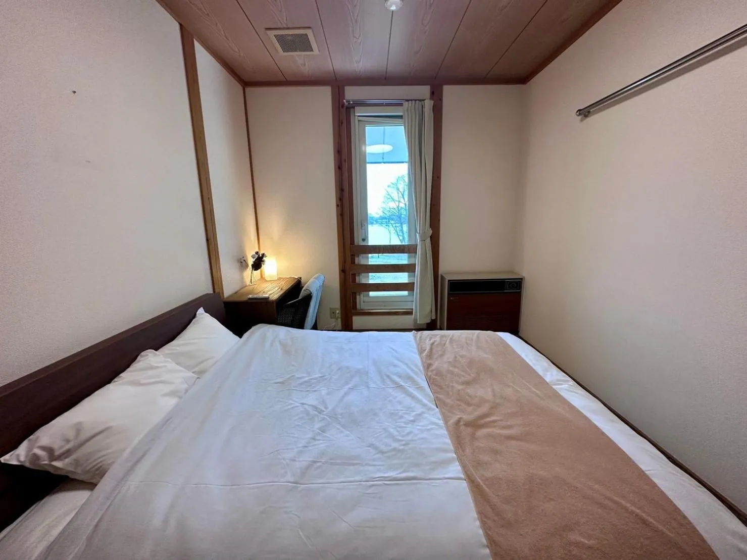 Photo of the whole room, Bed in Lakeside Hotels Kuore