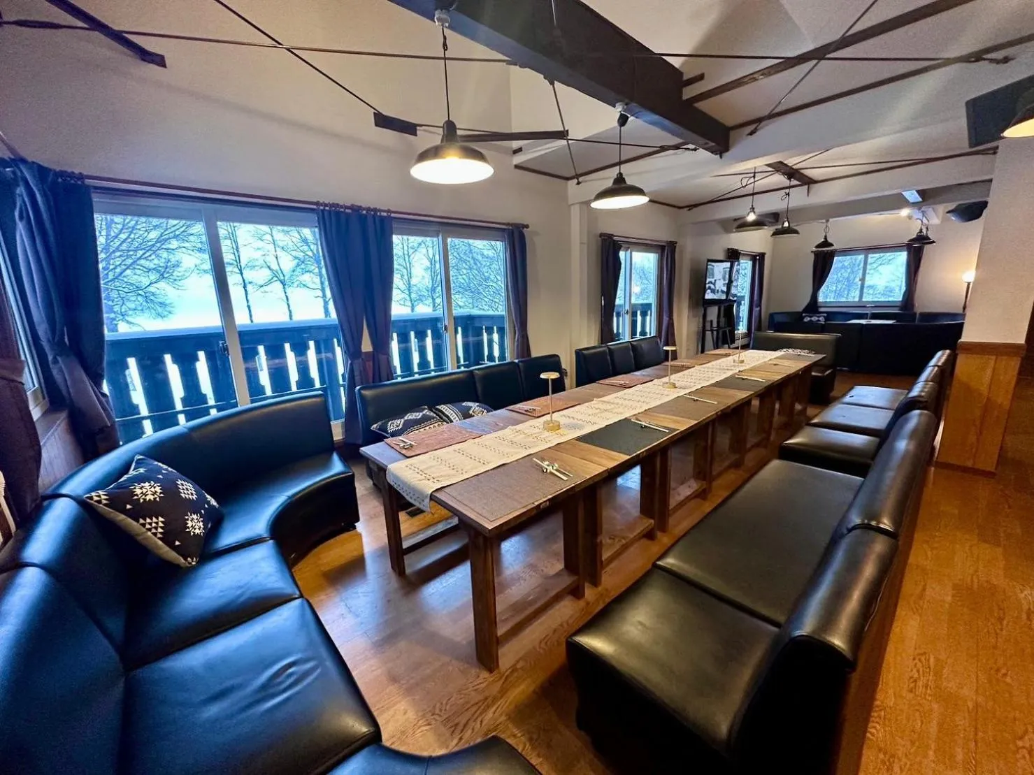 Communal lounge/ TV room in Lakeside Hotels Kuore