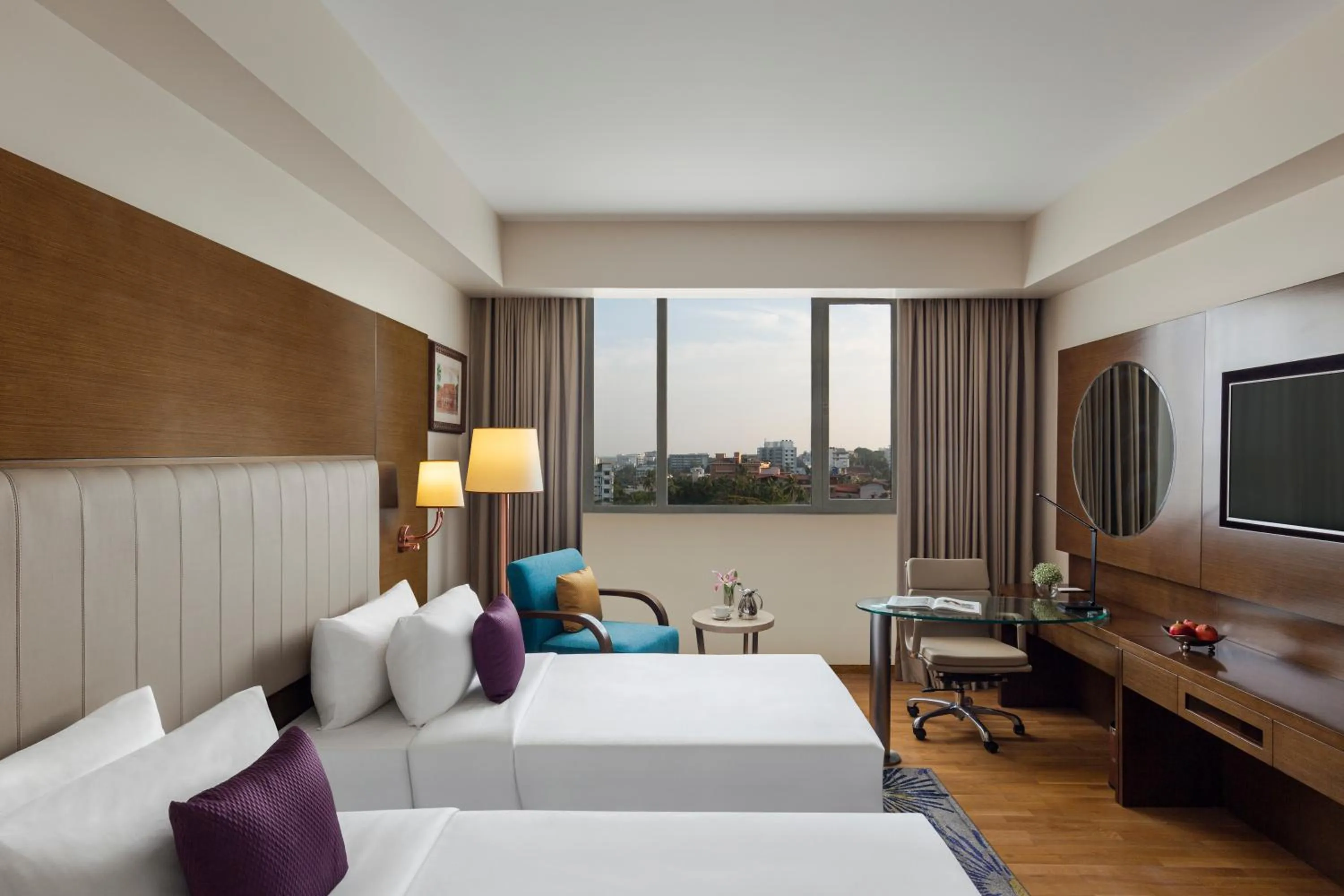 Photo of the whole room, Bed in Vivanta Thiruvananthapuram