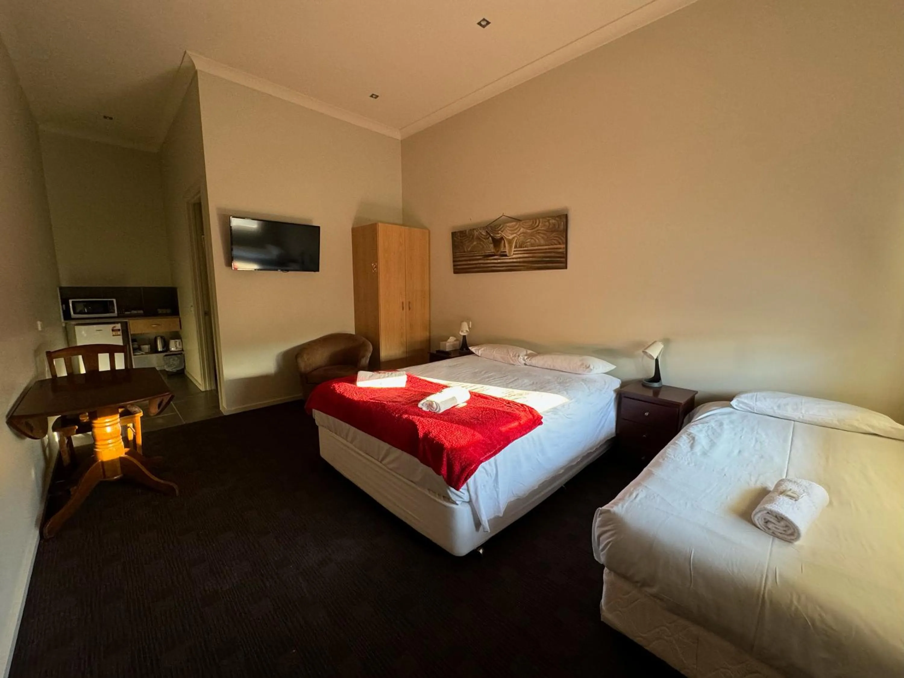 Bed in Falcon Hotel Motel