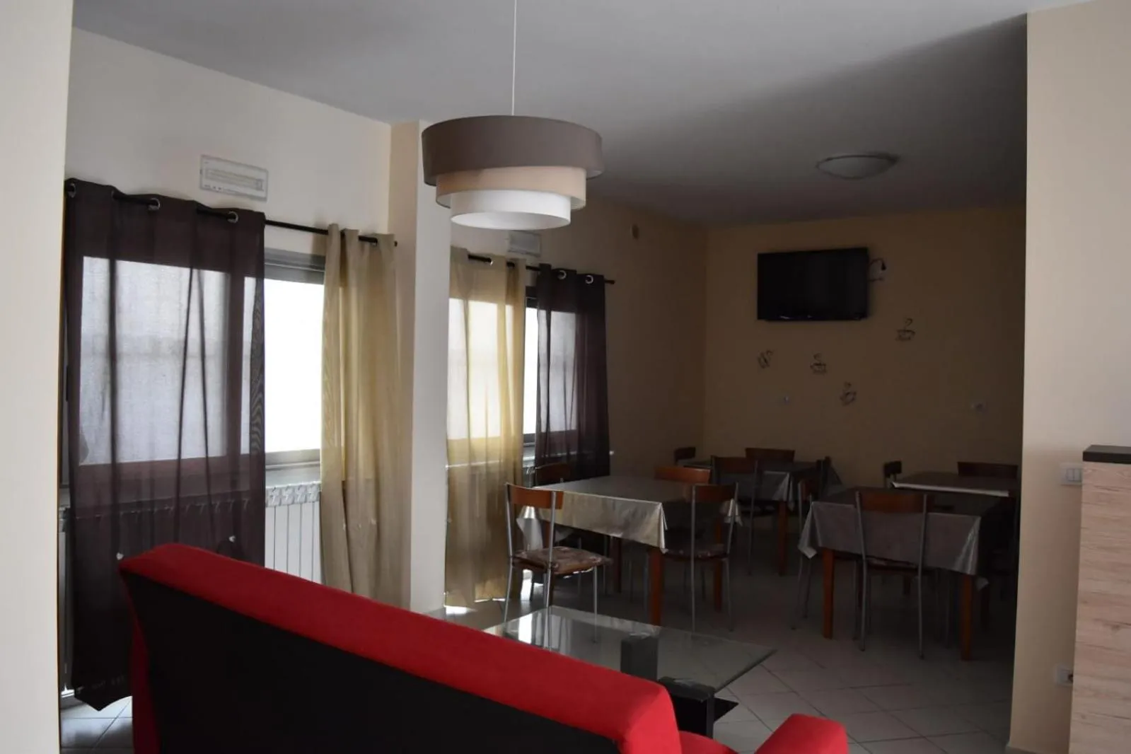 Communal lounge/ TV room in La Dea