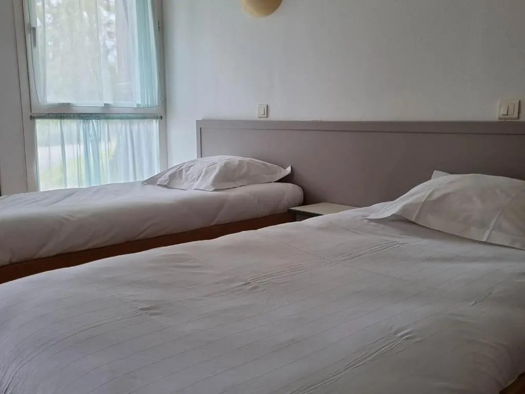 Bed in Hôtel Eden Lake