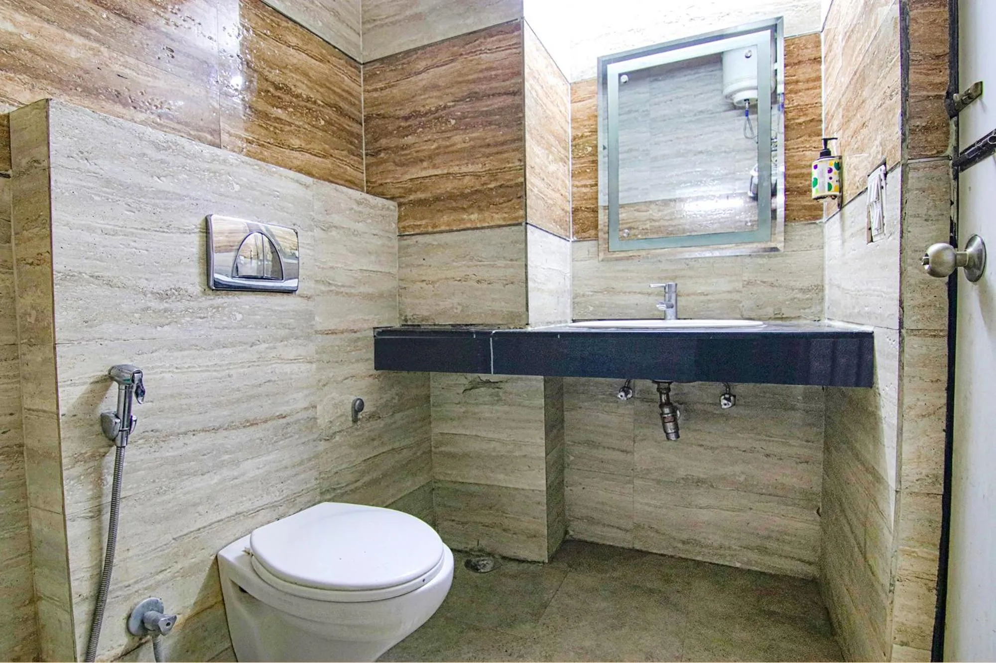 Bathroom in FabHotel Singh Suite - DLF Phase 3, Gurugram
