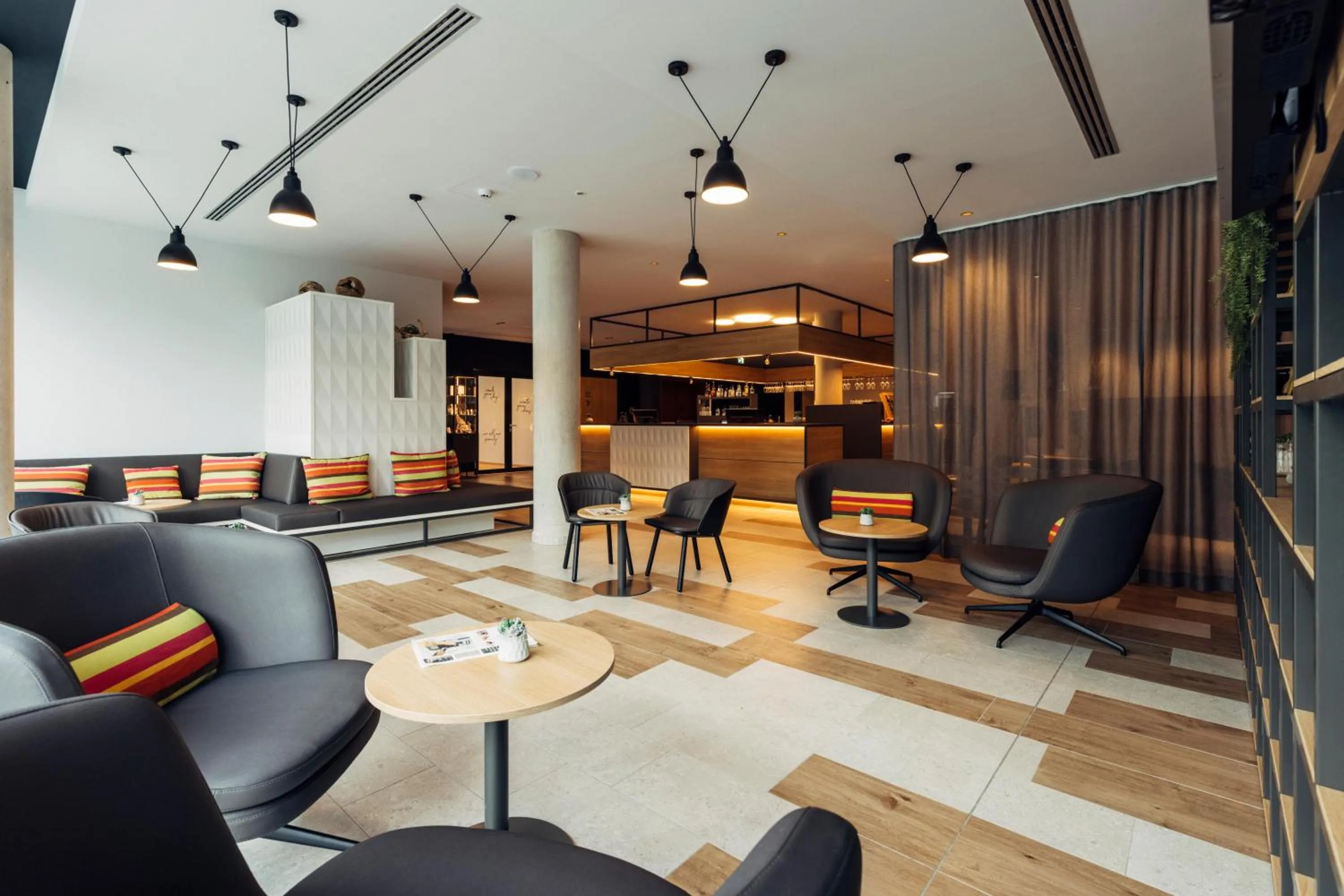 Lobby or reception in harry's home Bischofshofen hotel & apartments