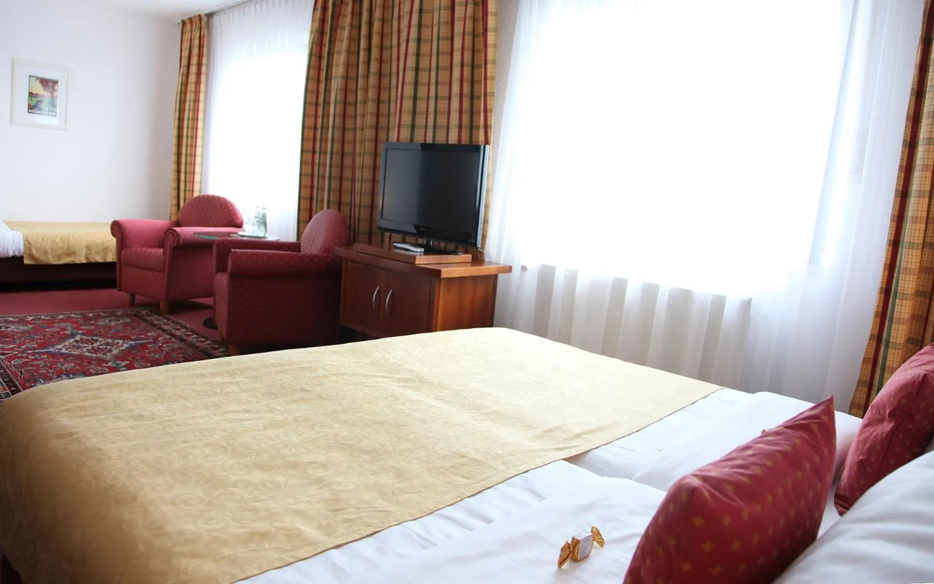 Photo of the whole room, Bed in Cityhotel Amadeus