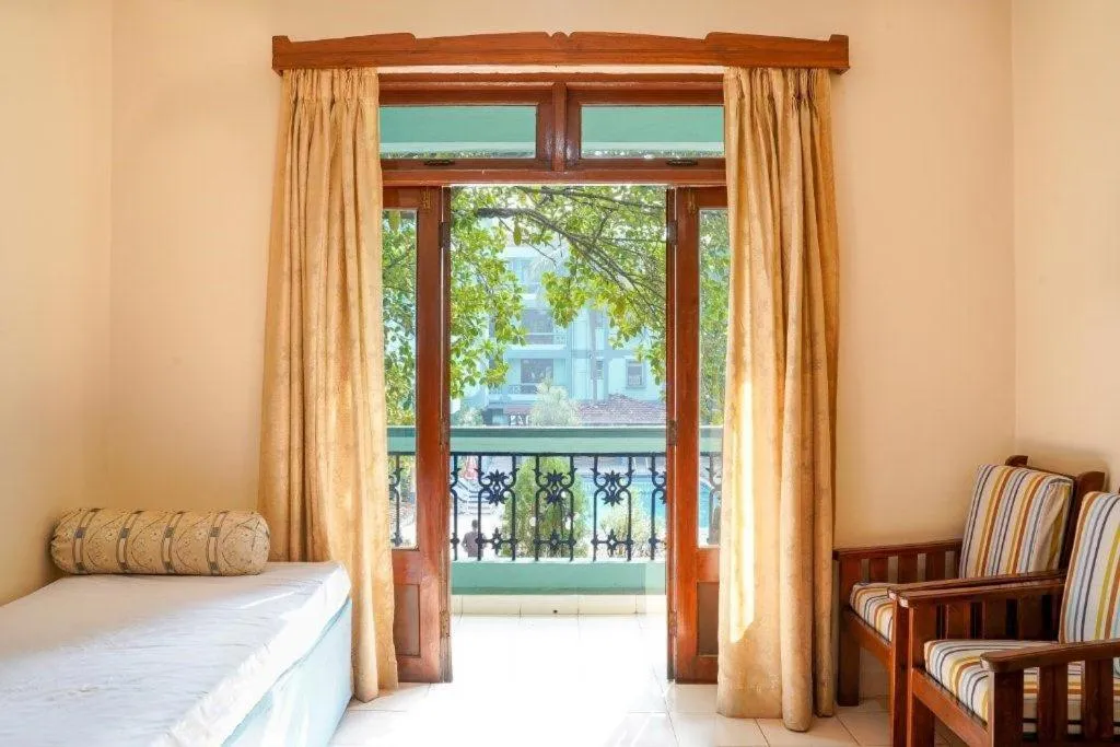 Seating area, Bed in Osborne Holiday Resorts