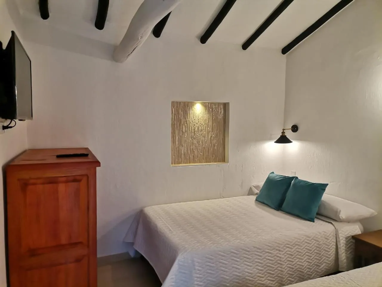 Photo of the whole room, Bed in Hospedaje Casa Santa Isabel