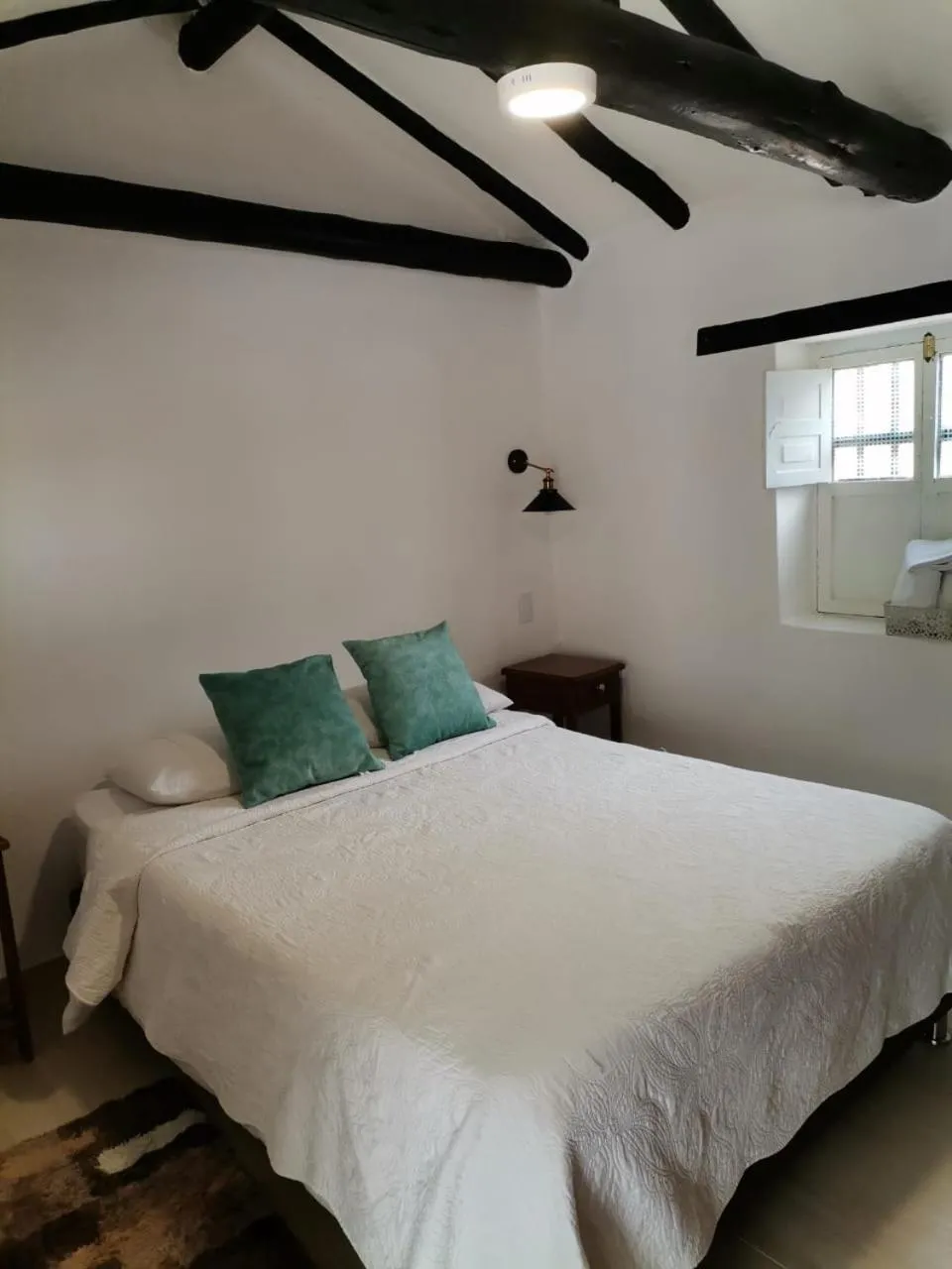 Bed in Hospedaje Casa Santa Isabel