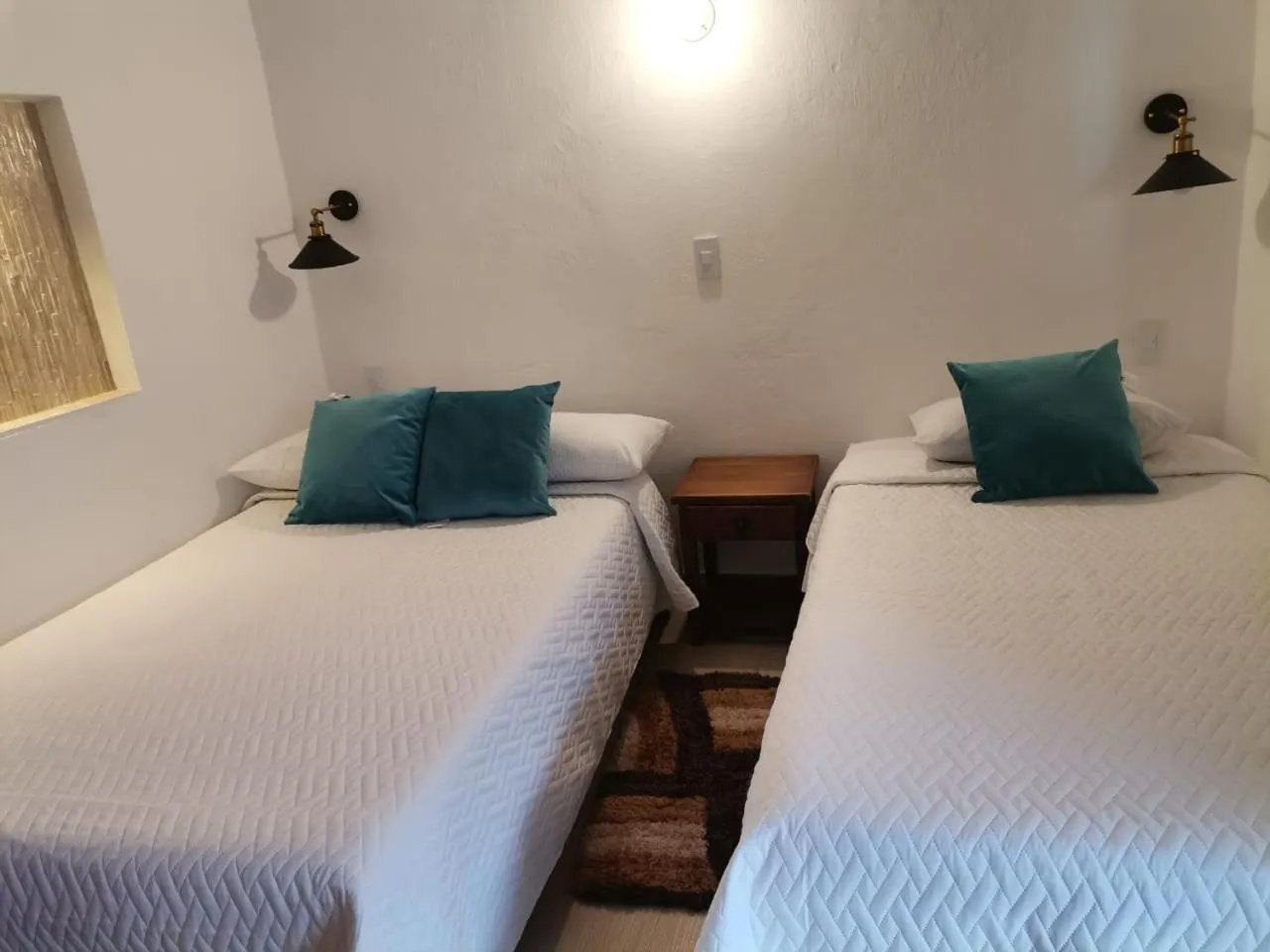 Photo of the whole room, Bed in Hospedaje Casa Santa Isabel