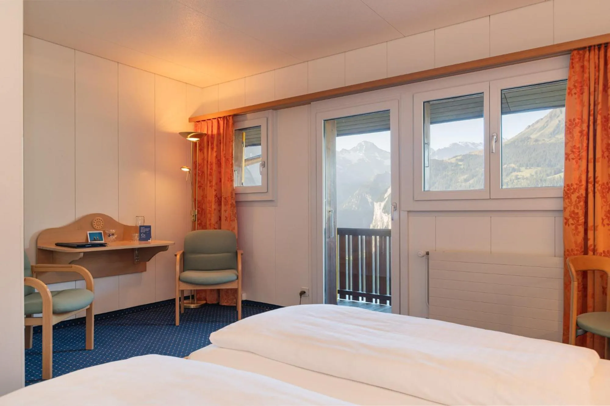 Bed in Hotel Bellevue - Traditional Swiss Hideaway