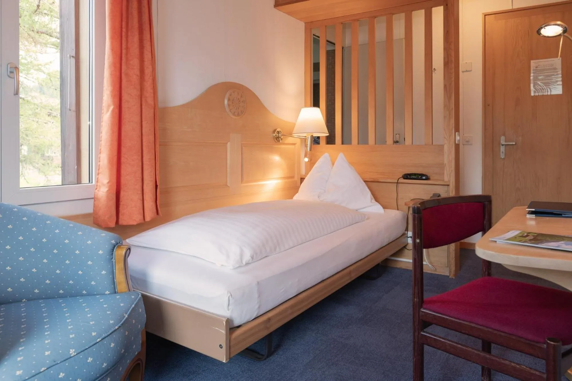 Bed in Hotel Bellevue - Traditional Swiss Hideaway