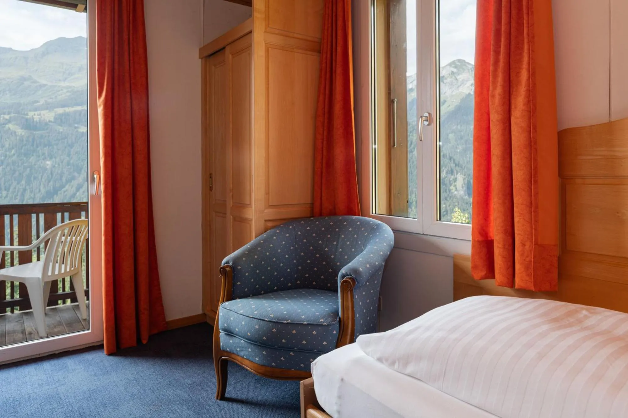 Bed in Hotel Bellevue - Traditional Swiss Hideaway