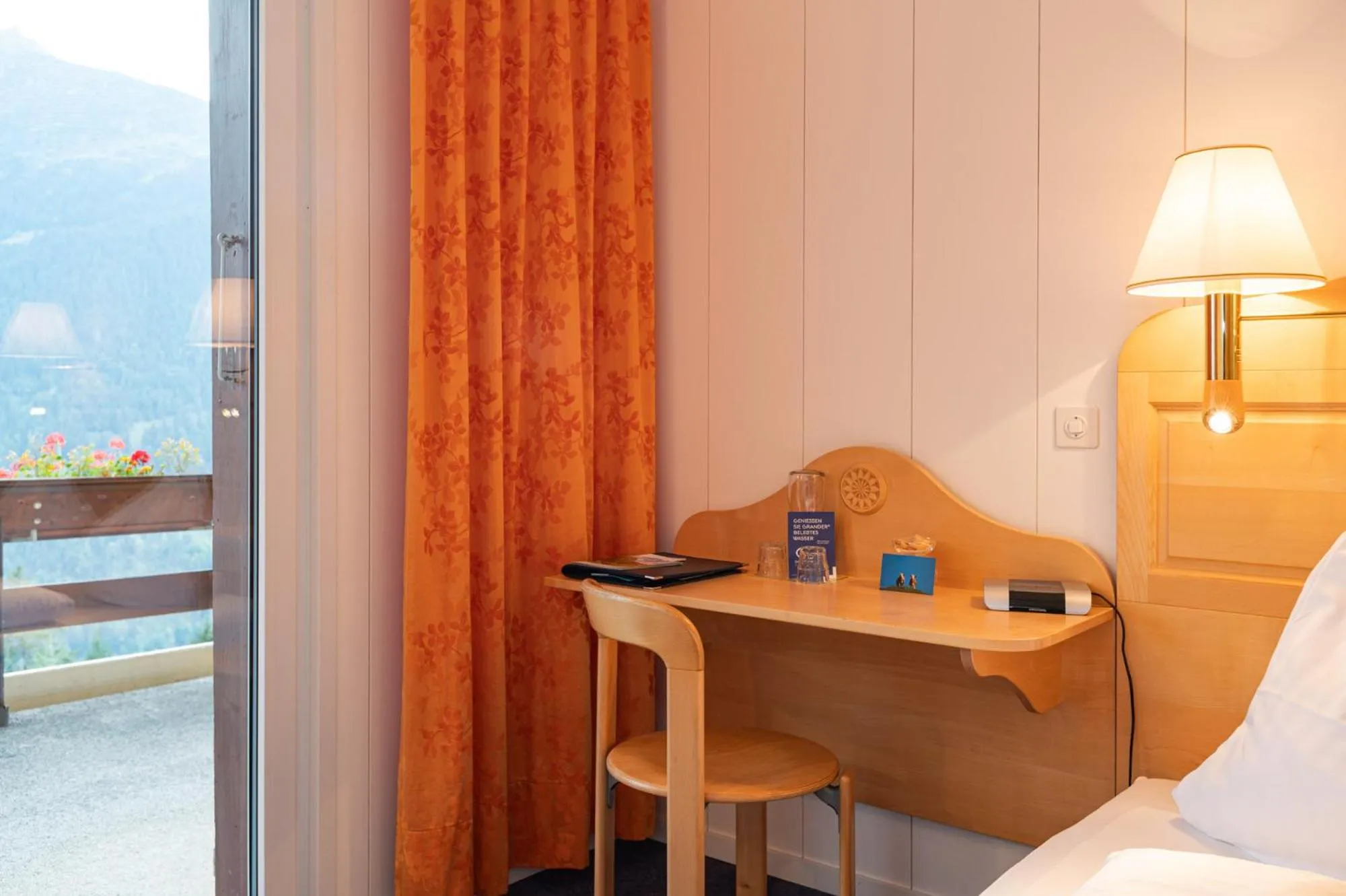 Bed in Hotel Bellevue - Traditional Swiss Hideaway