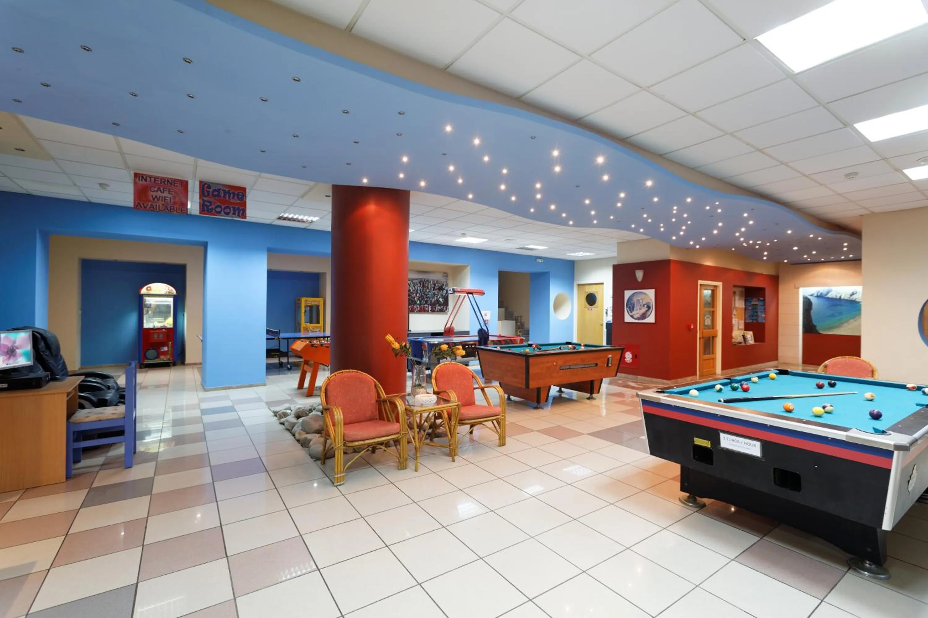 Communal lounge/ TV room in Agrabella Hotel - Adults Only