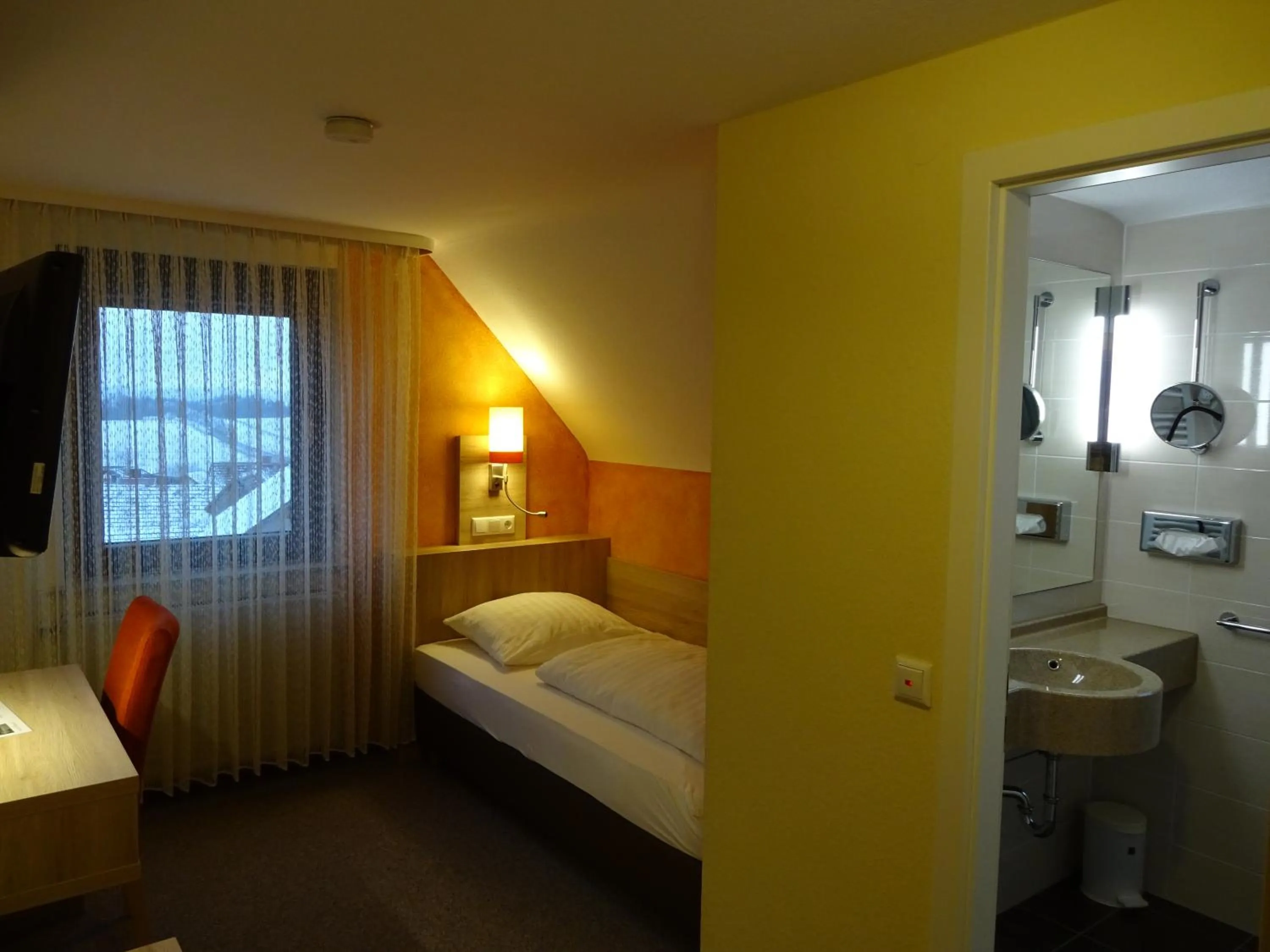 Photo of the whole room, Bed in Gasthof Hotel Zum Ross