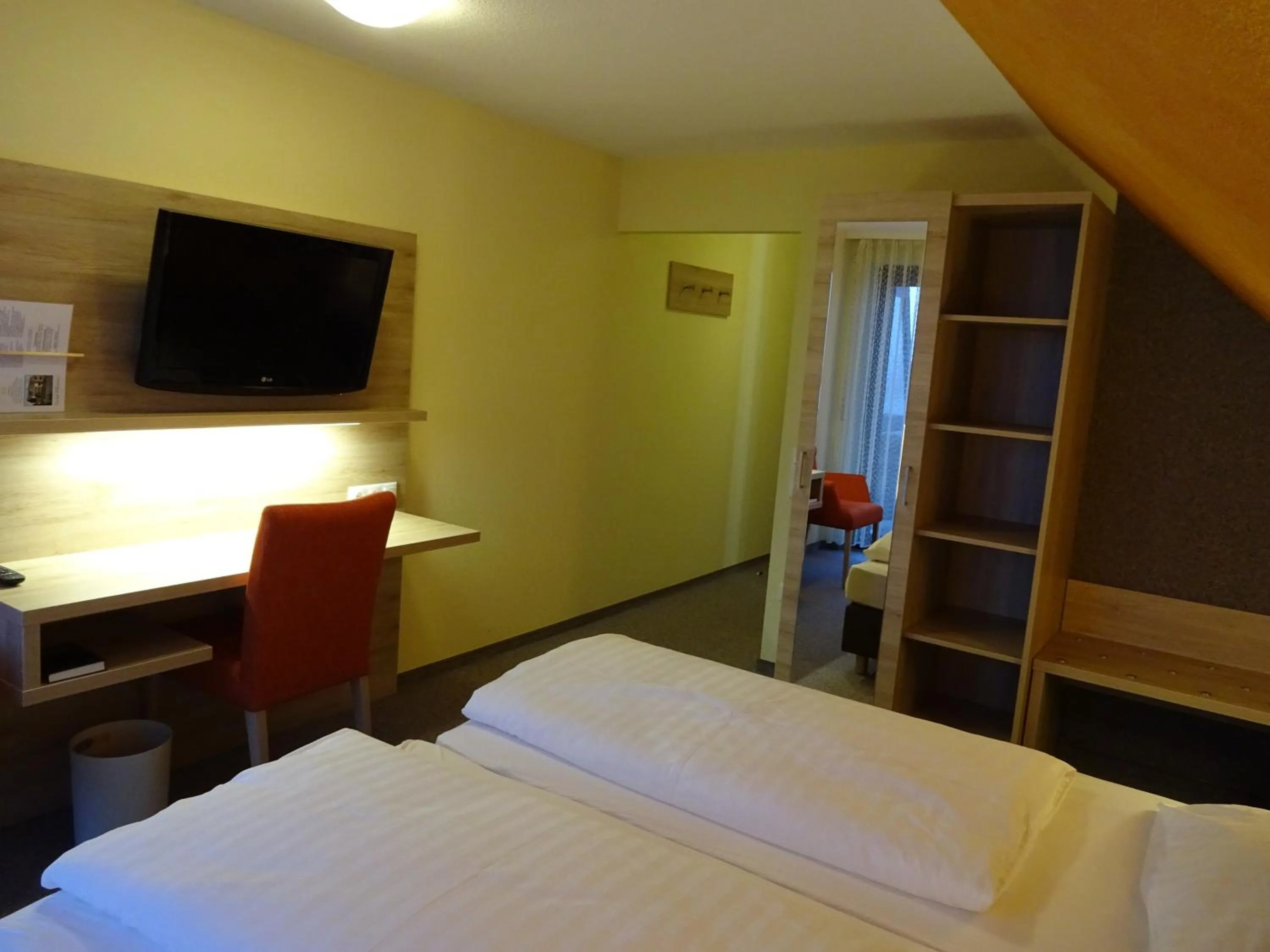 Photo of the whole room, Bed in Gasthof Hotel Zum Ross