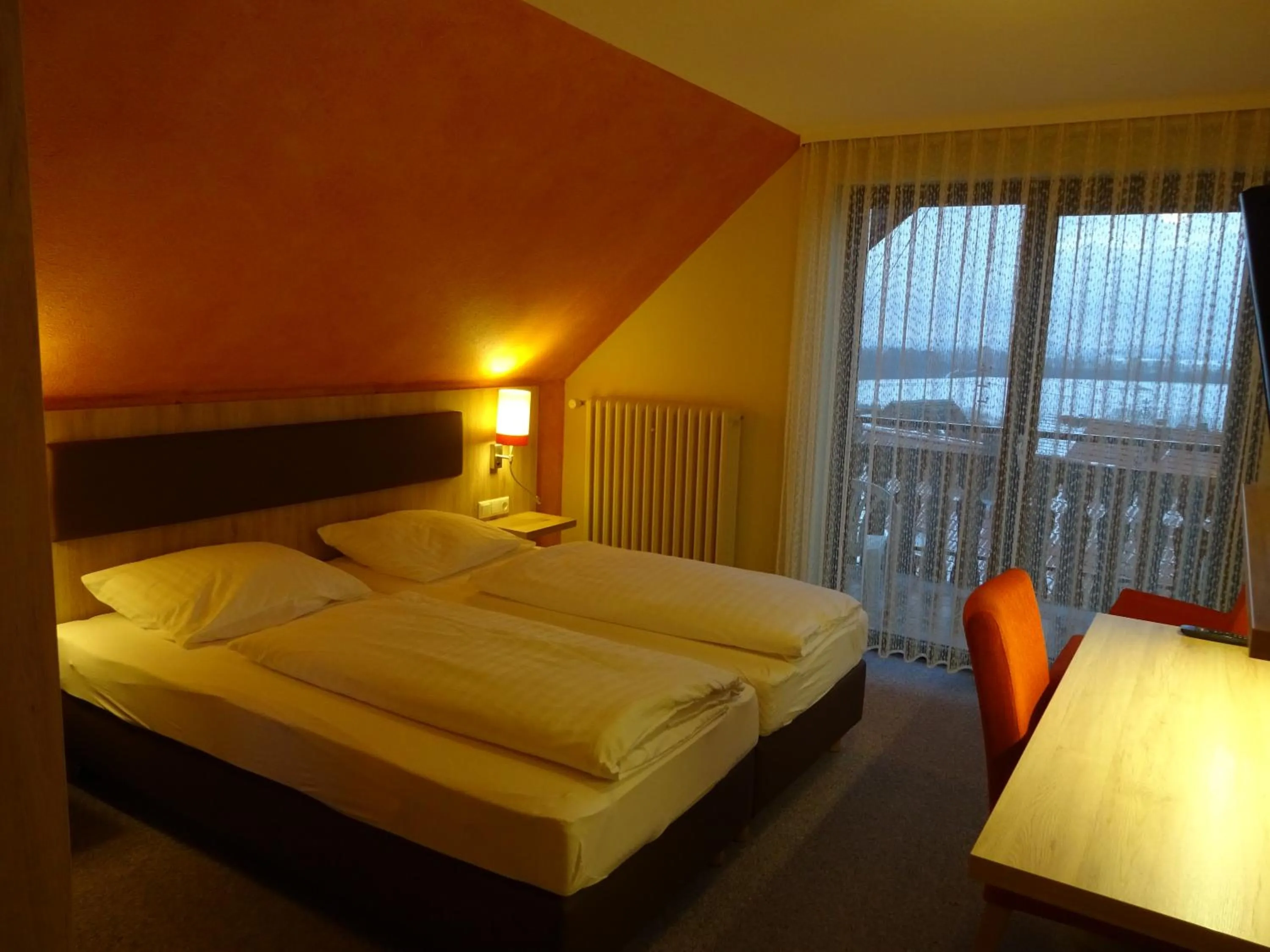 Photo of the whole room, Bed in Gasthof Hotel Zum Ross