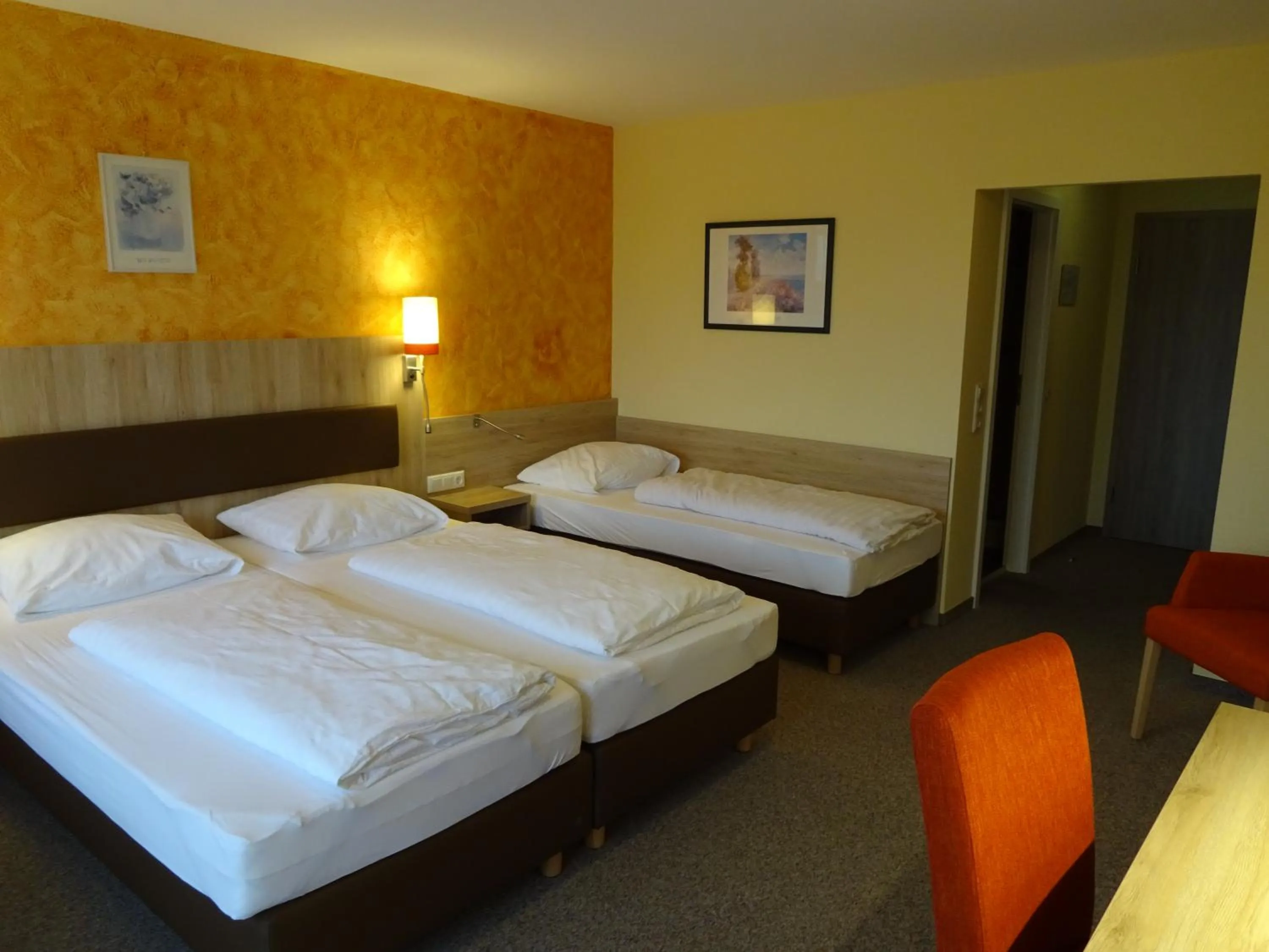 Photo of the whole room, Bed in Gasthof Hotel Zum Ross