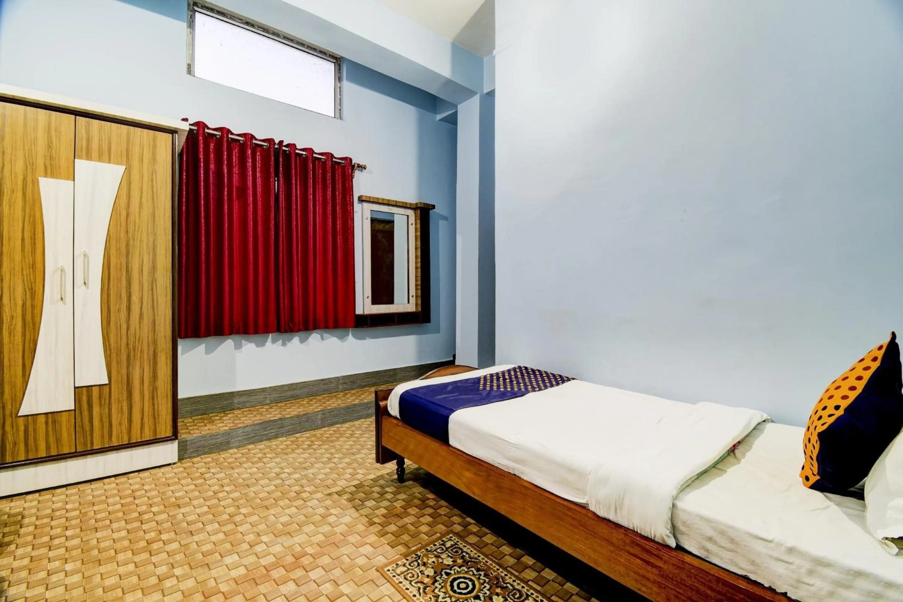 Bedroom in Hotel O NANDINI