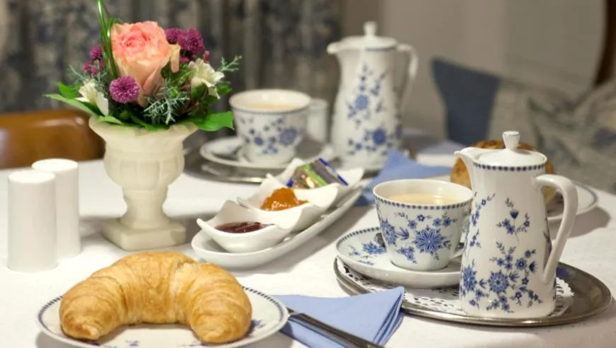 Dining area in Alpina Hotel
