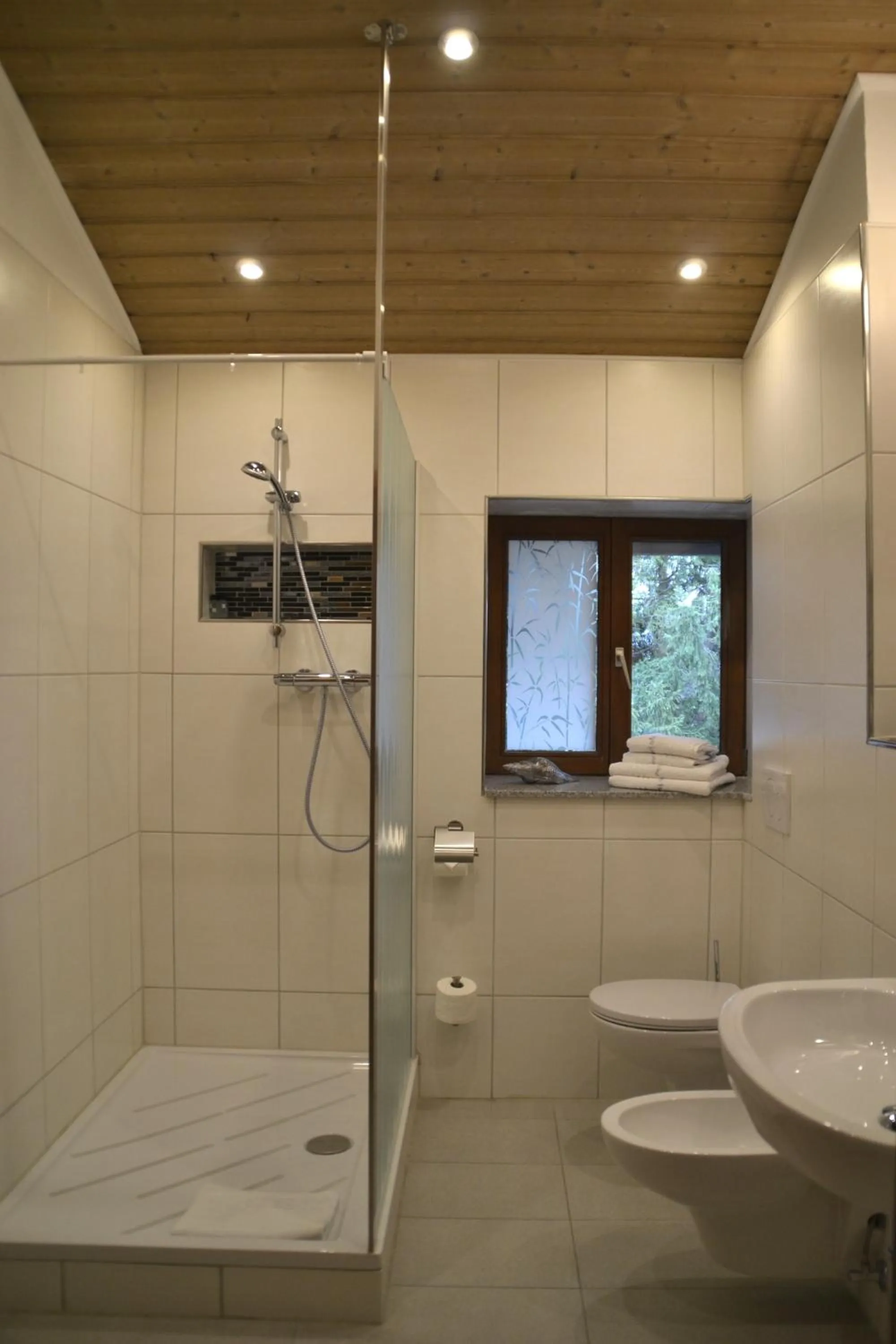 Bathroom in Alpina Hotel