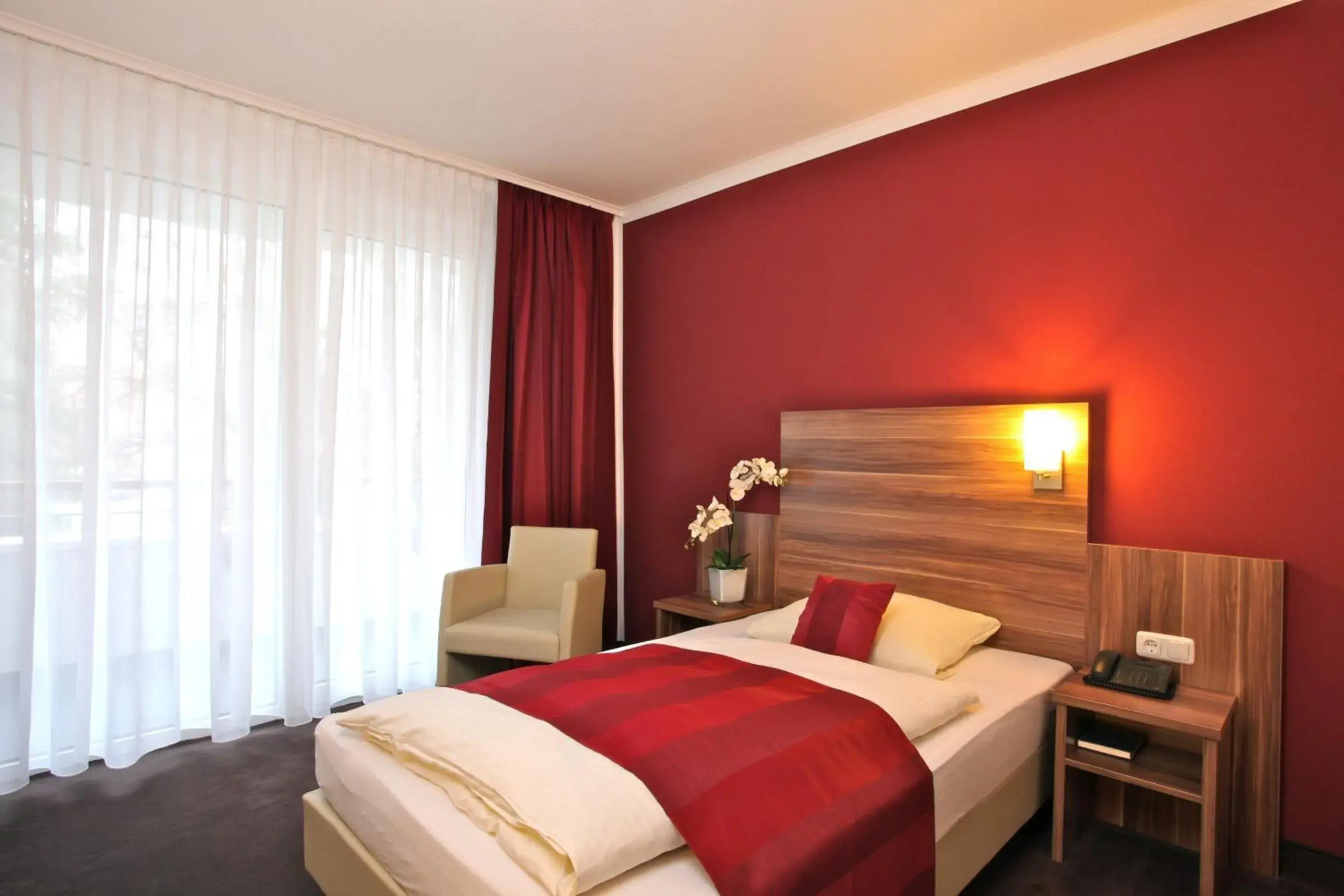 Photo of the whole room, Bed in Waldhotel Bad Soden