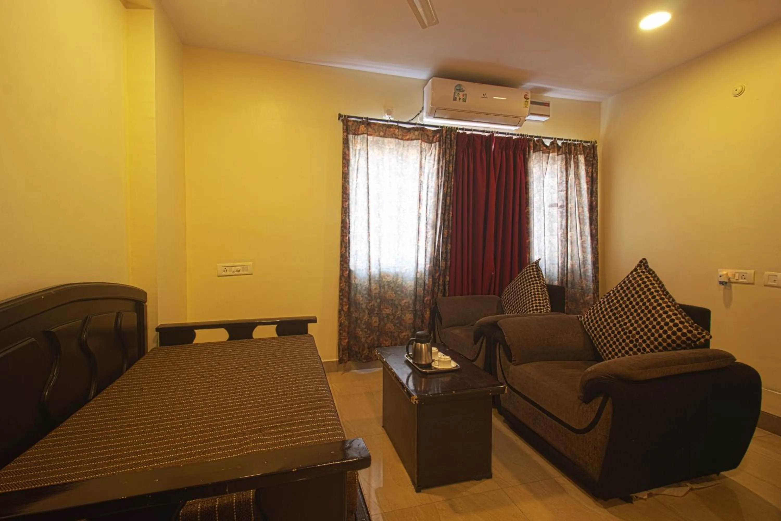 Seating area in Hotel NS Royal Emirates With 3Hr Early check in