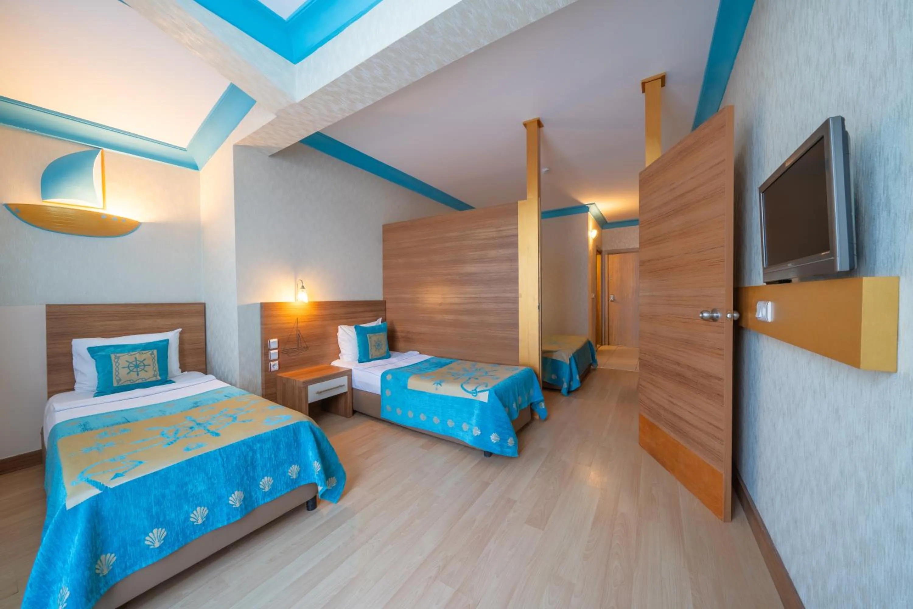 Communal lounge/ TV room, Bed in Miarosa Kemer Beach