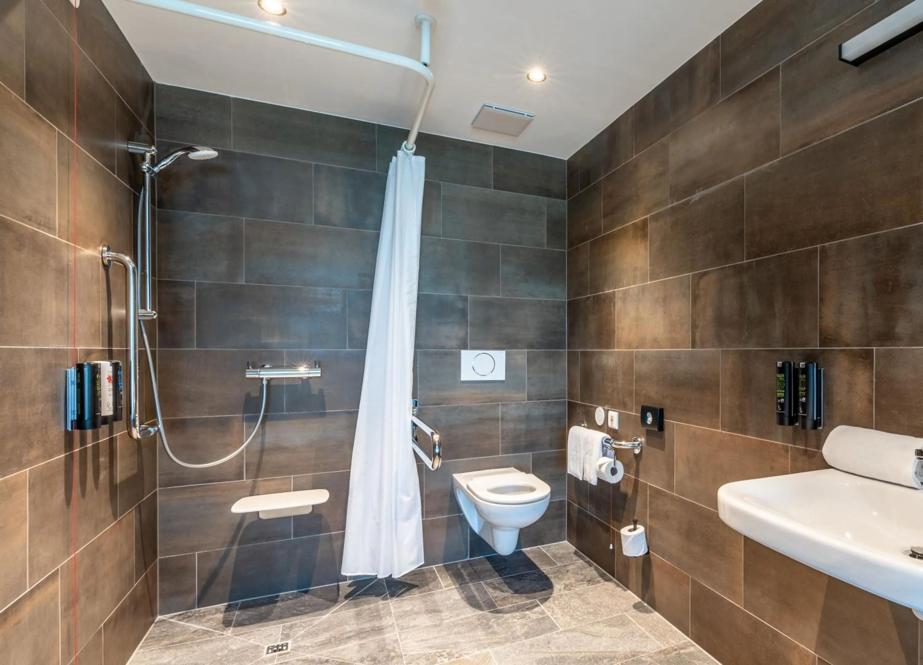 Bathroom in Aiden by Best Western Stadtgut Hotel Steyr - FREE PARKING