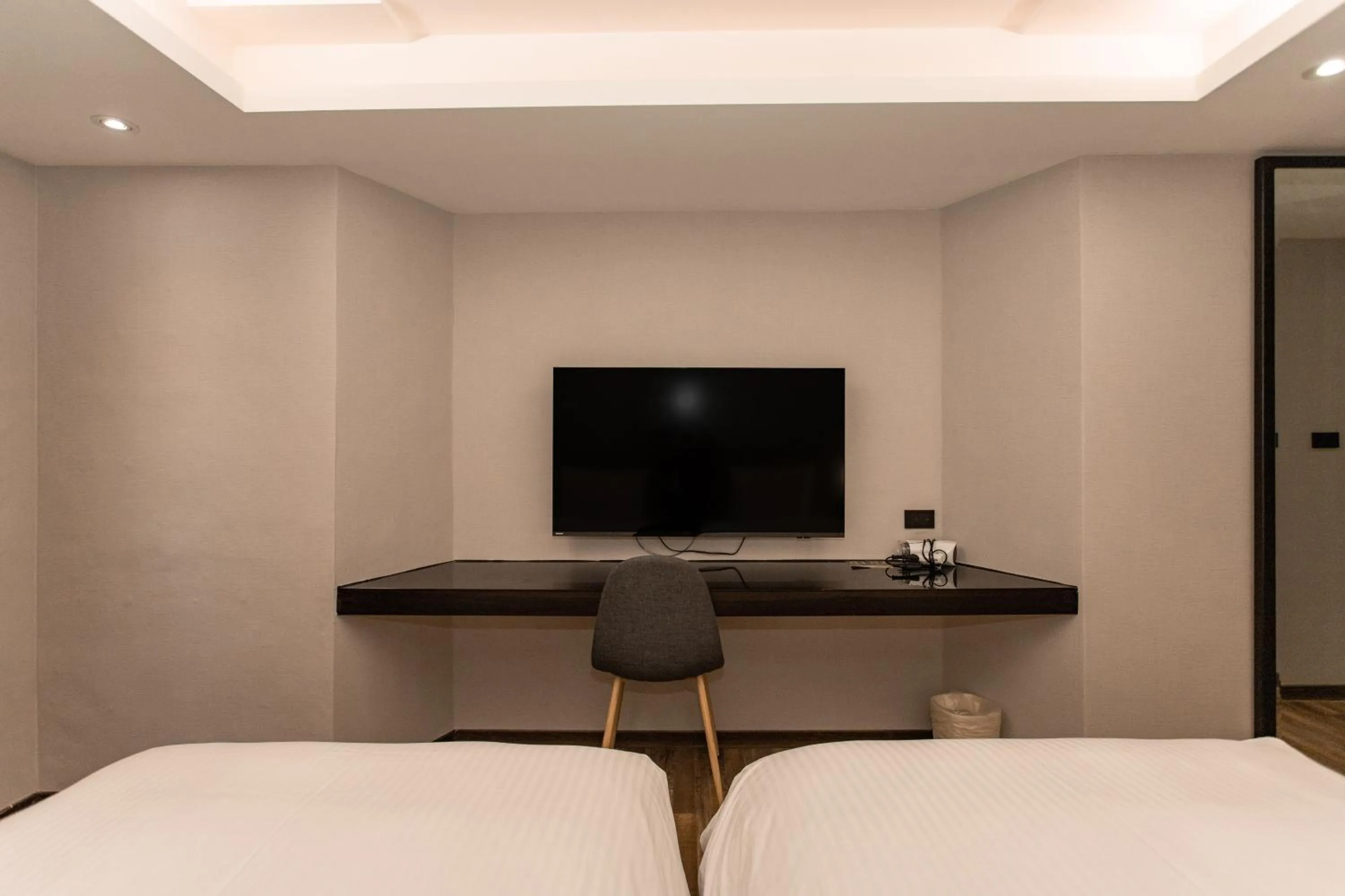 Bed in HUB HOTEL Tucheng