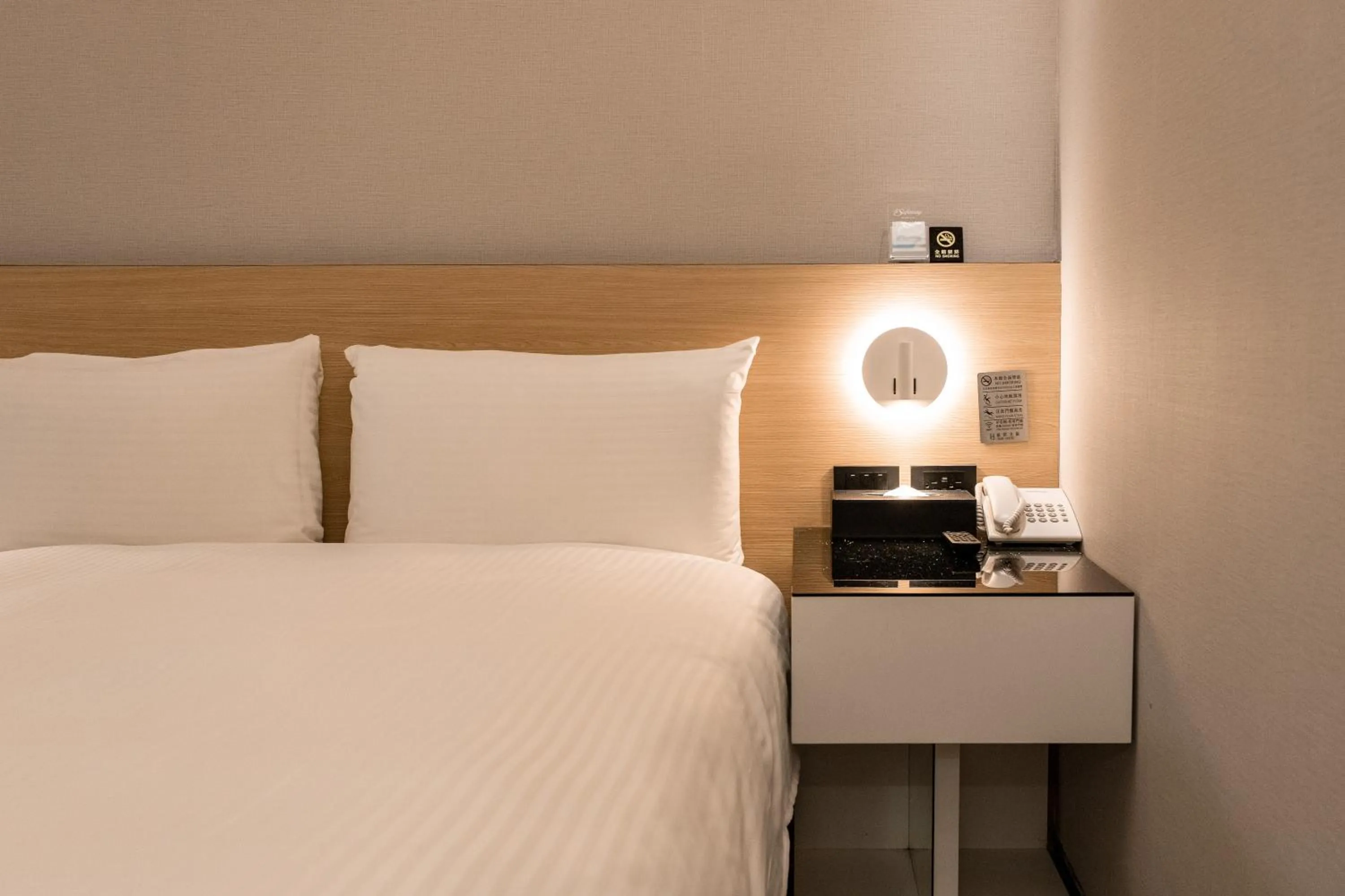 Bed in HUB HOTEL Tucheng