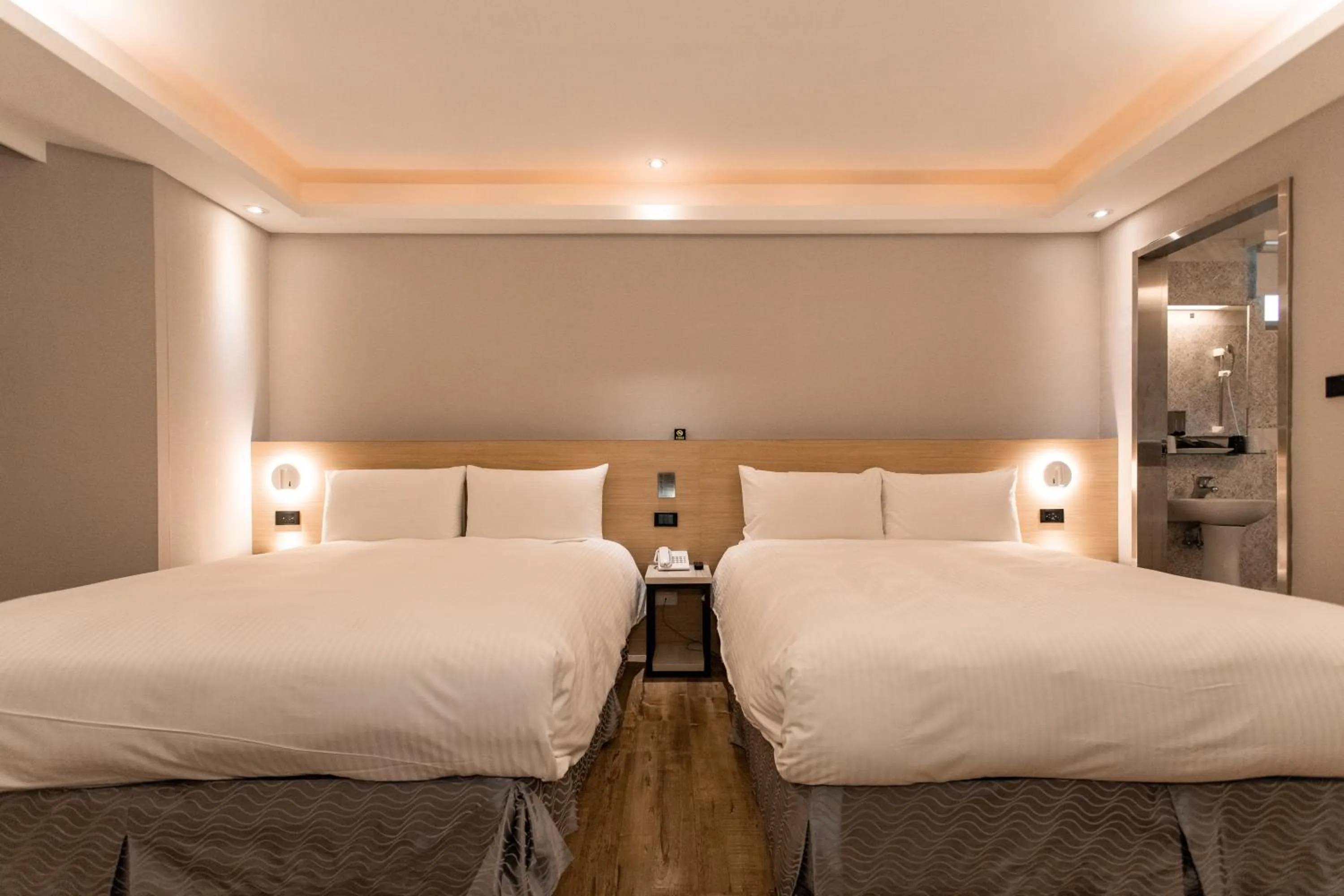 Bed in HUB HOTEL Tucheng