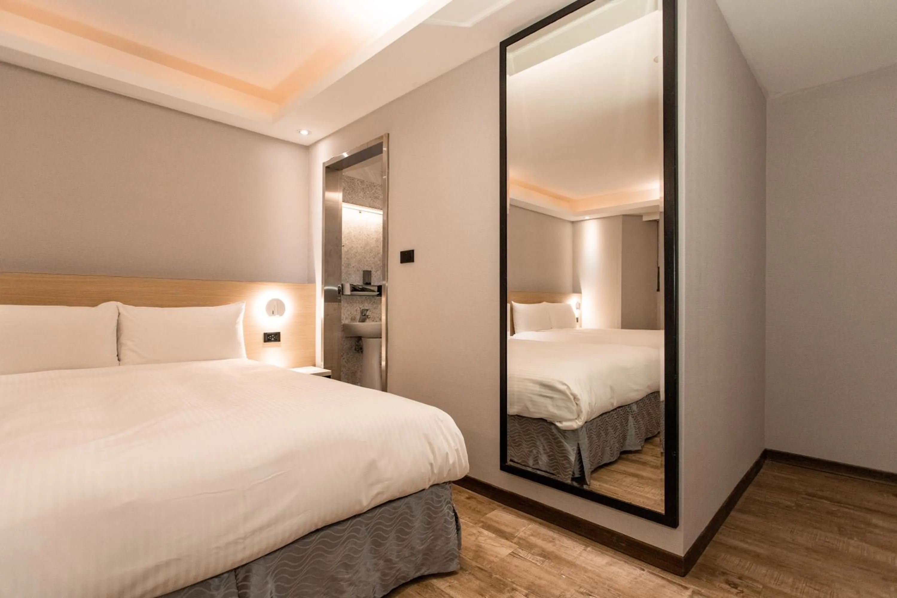 Bed in HUB HOTEL Tucheng