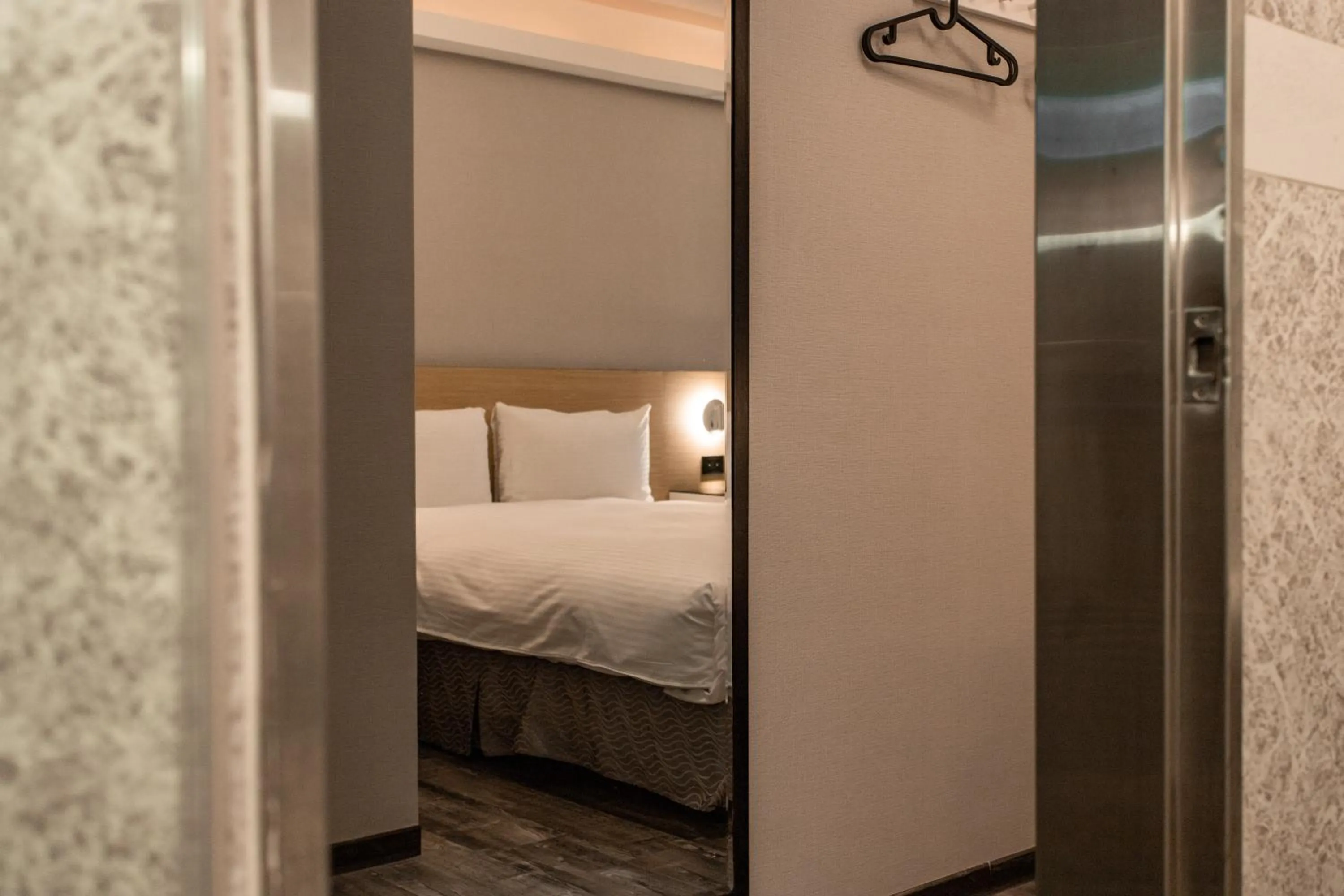 Bed in HUB HOTEL Tucheng