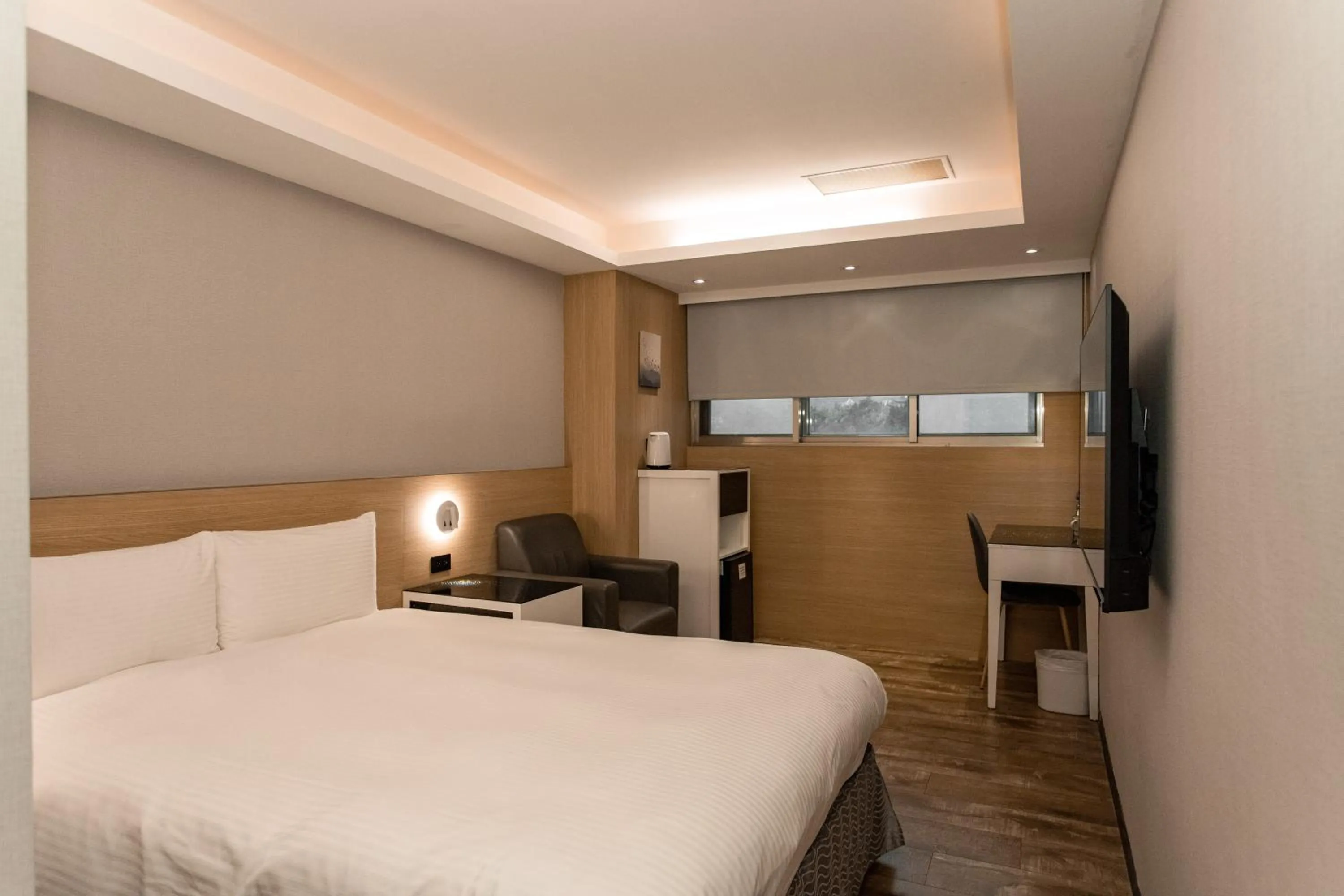 Bed in HUB HOTEL Tucheng