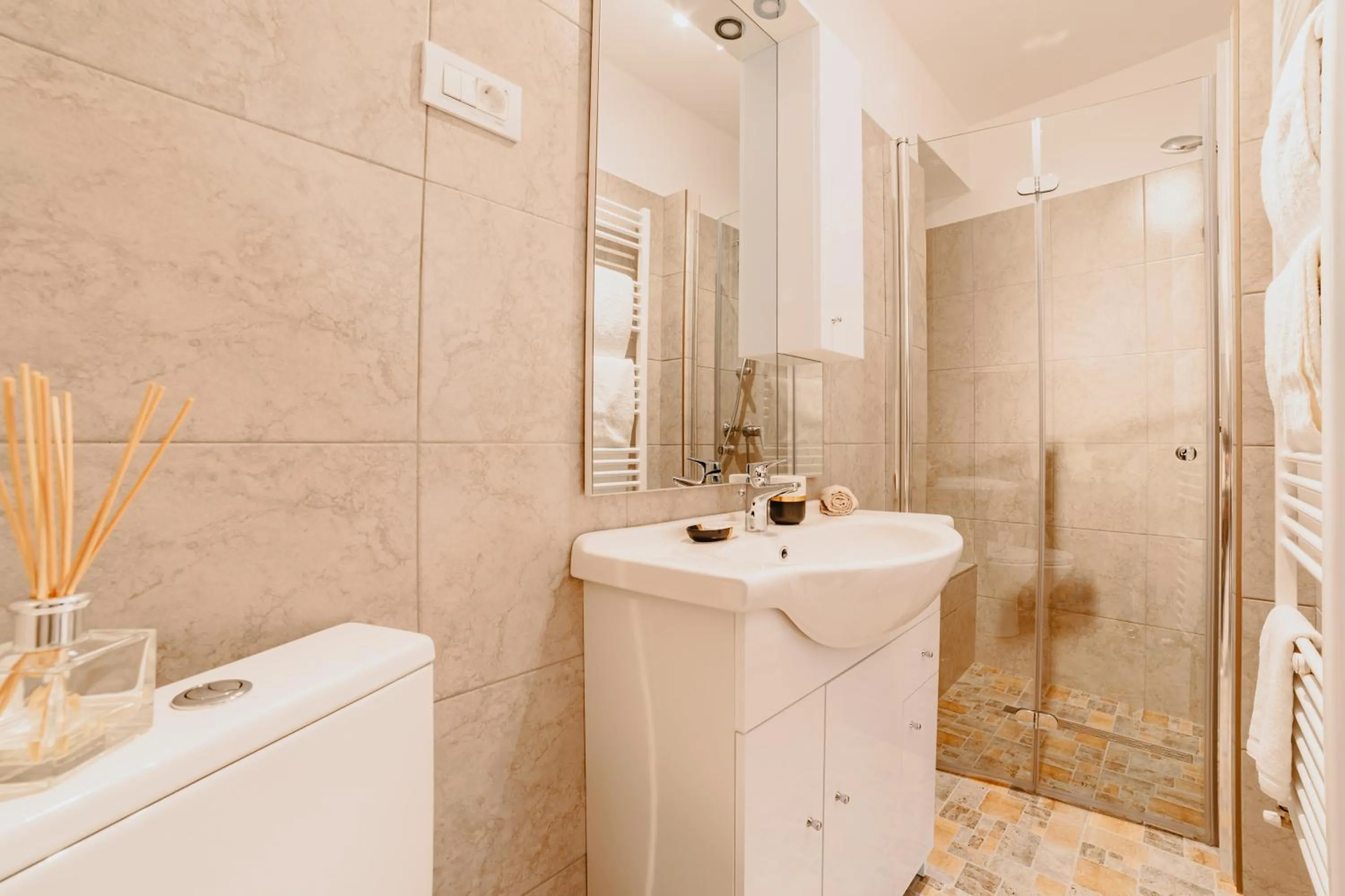 Shower in ALBERT RESIDENCE Brasov with complimentary parking and 10 percent Food and Drinks