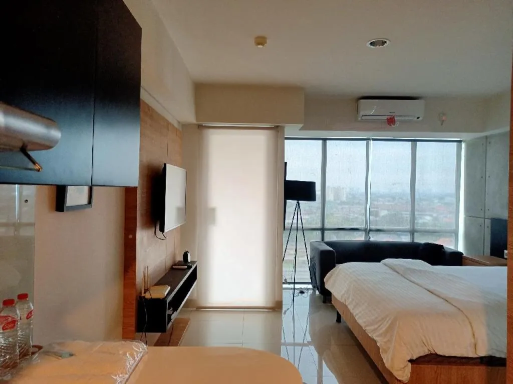 Photo of the whole room, Bed in Cozy The H Residence Cawang by Bonzela Property