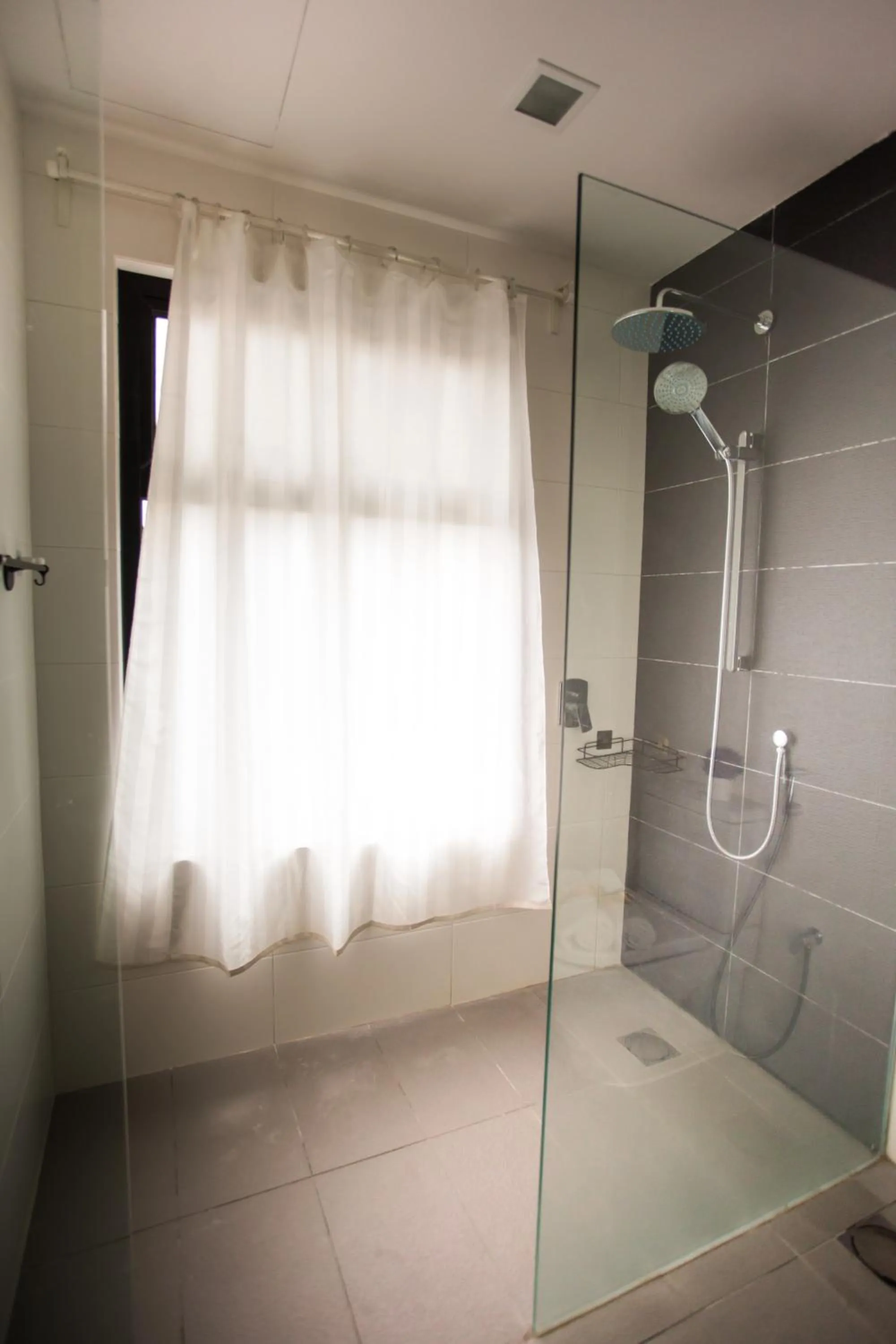 Shower in Suasana suites By The one