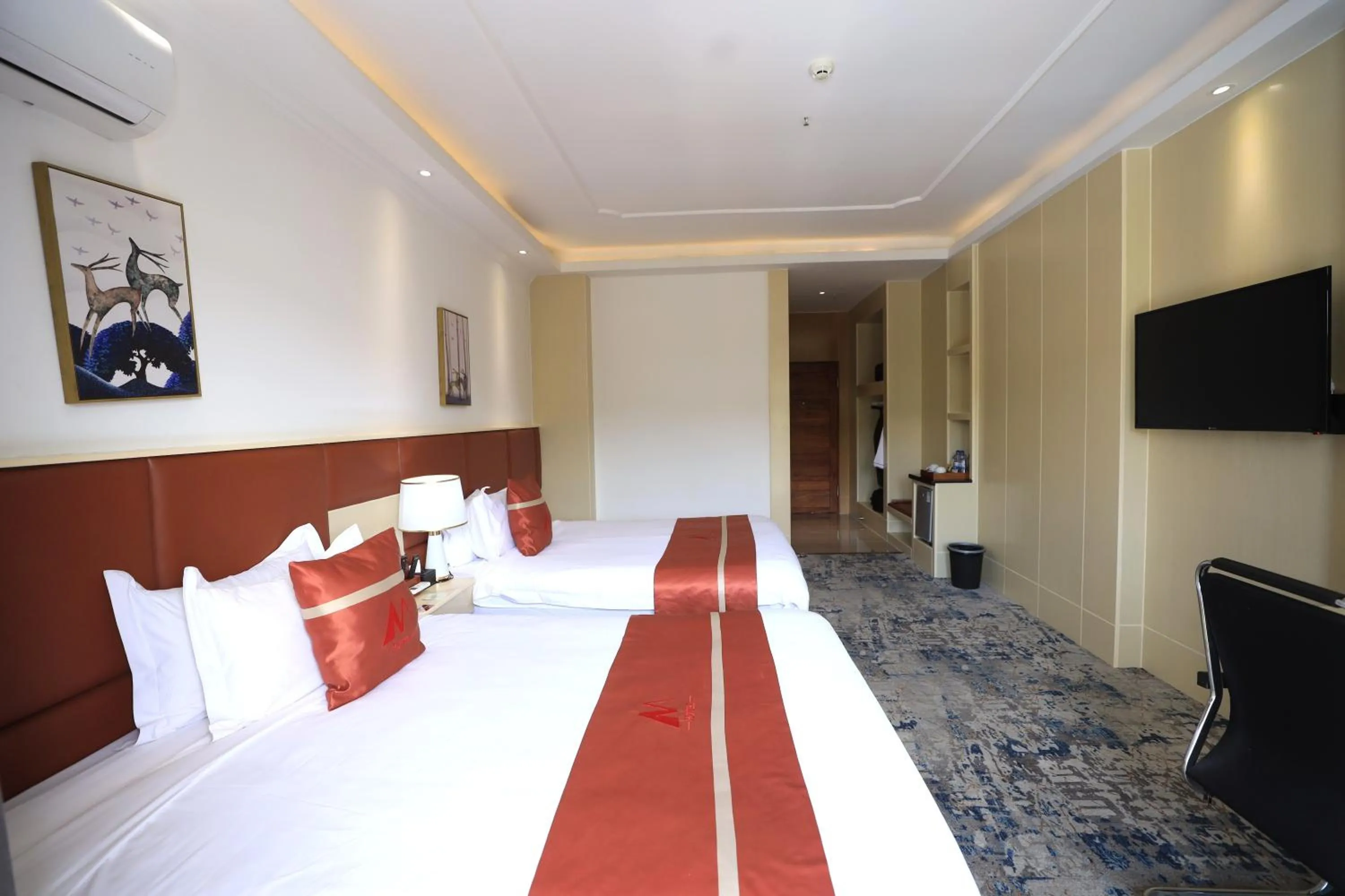 Photo of the whole room, Bed in M Hotel Kigali