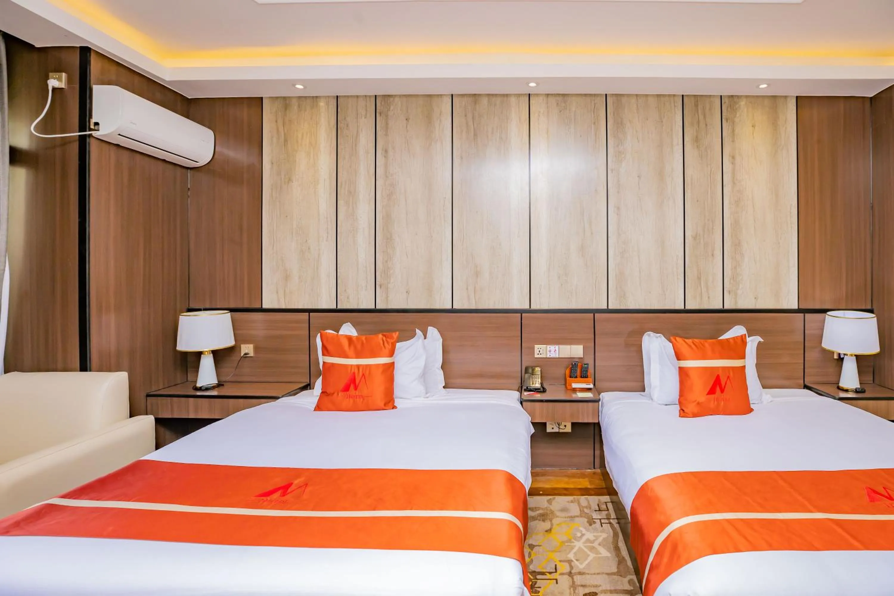 Property building, Bed in M Hotel Kigali