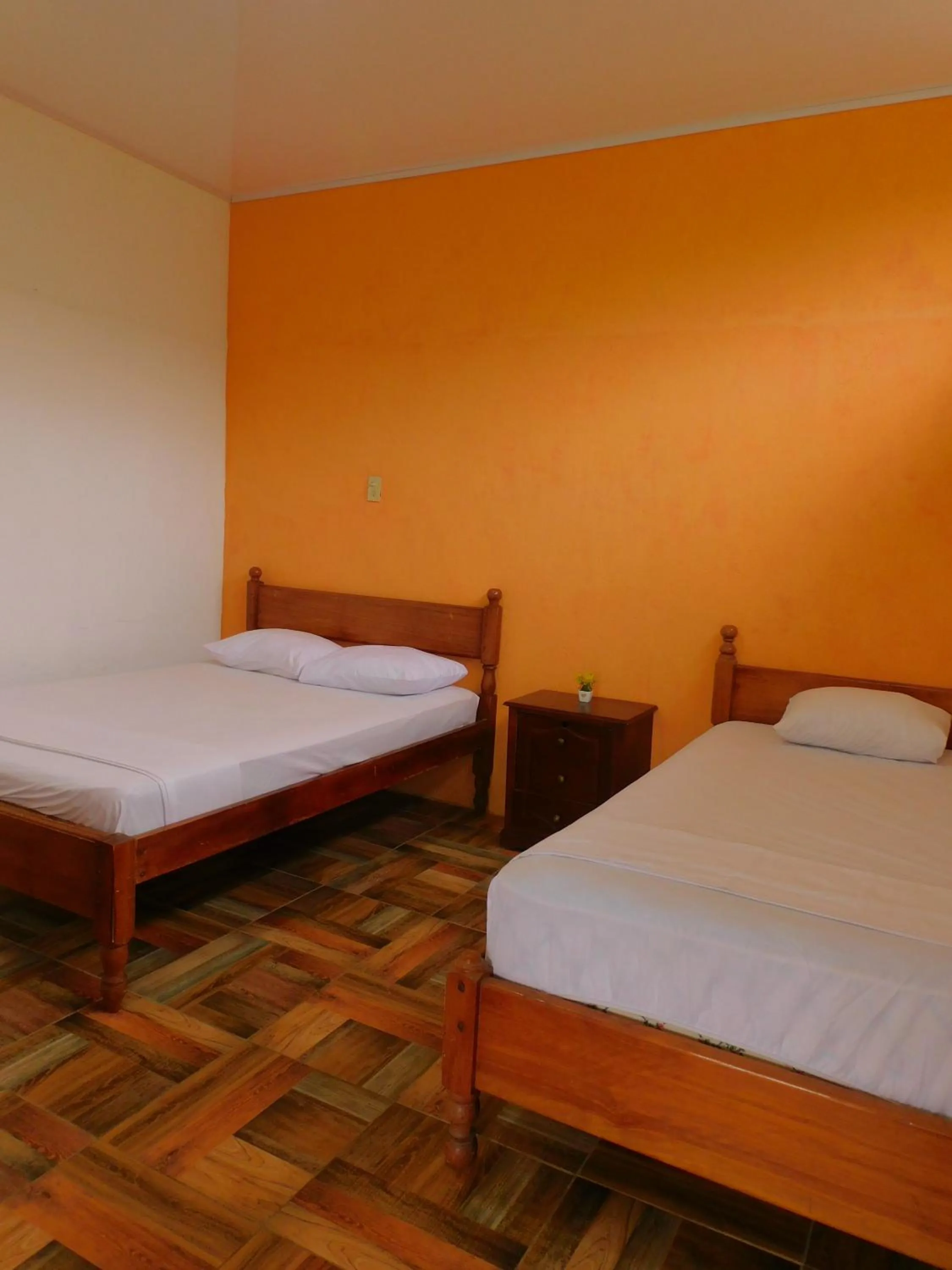 Bed in Puerto Quito Lodge