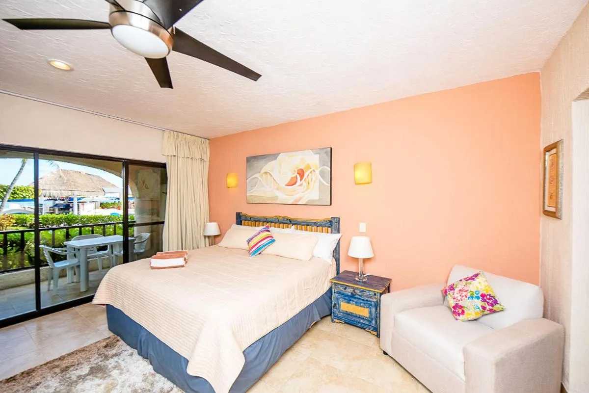 Bed in Xaman Ha Beach Front Condo