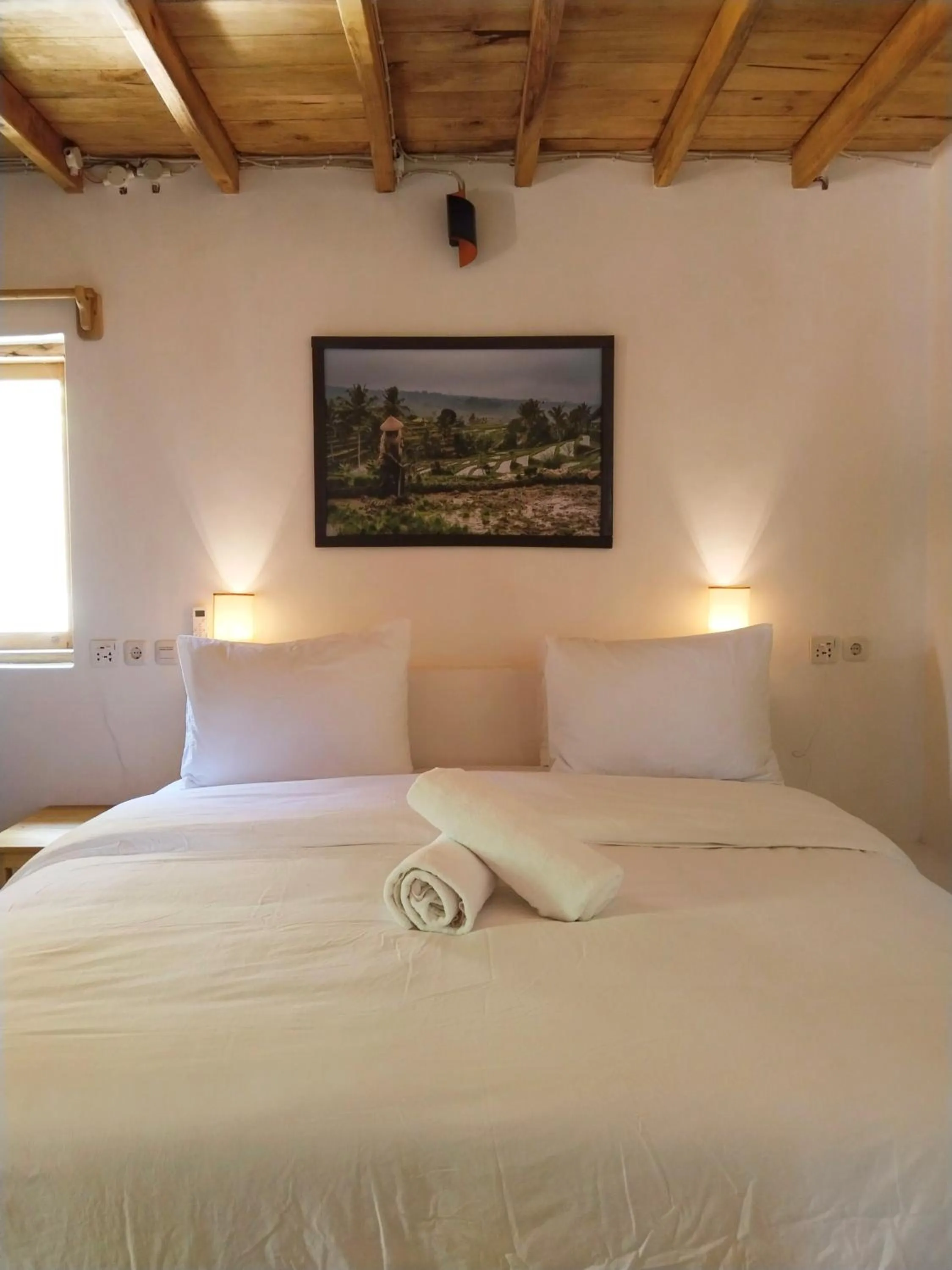 Bed in Blue Planet Dive Resort