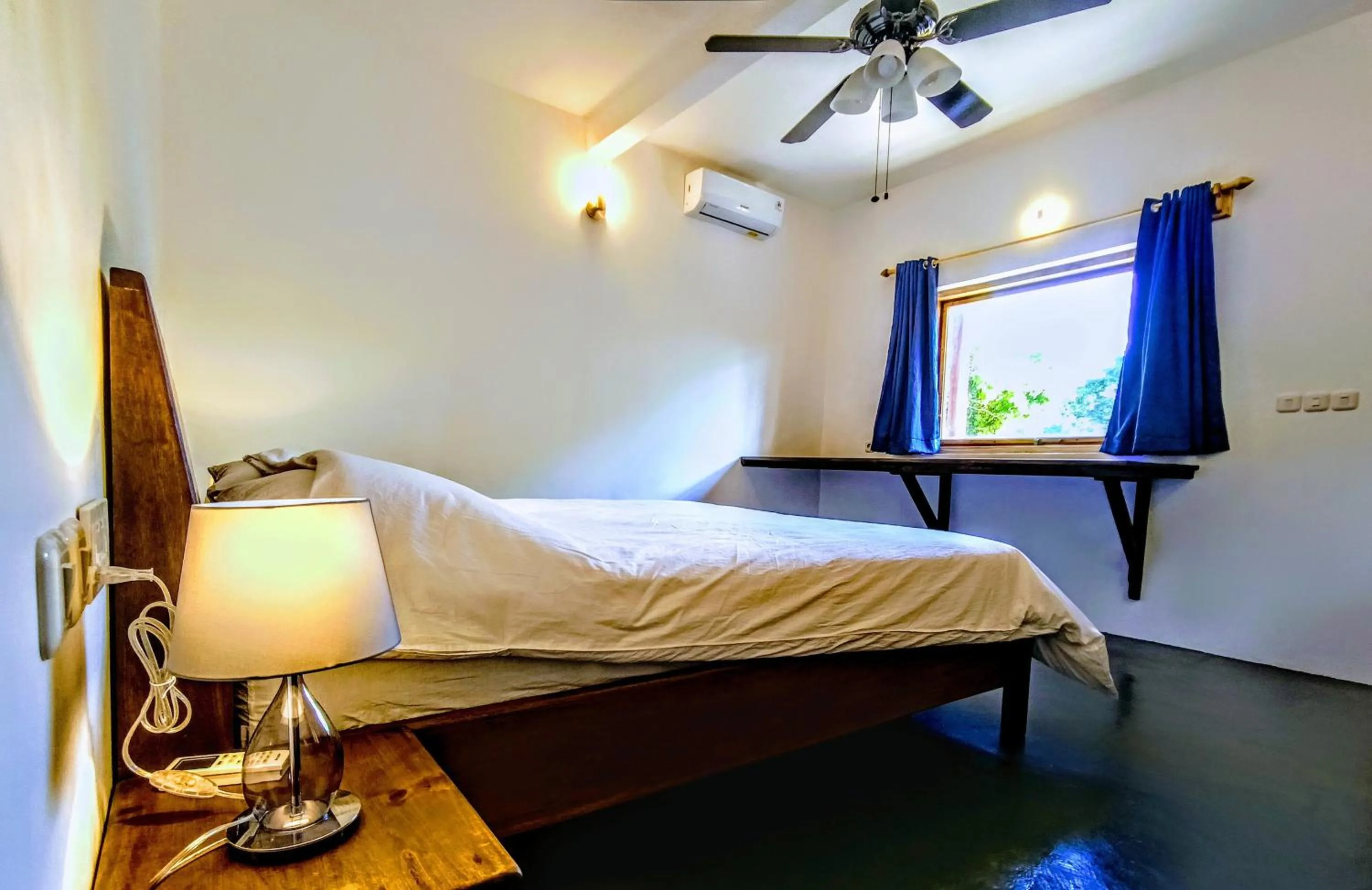 Bed in Blue Planet Dive Resort