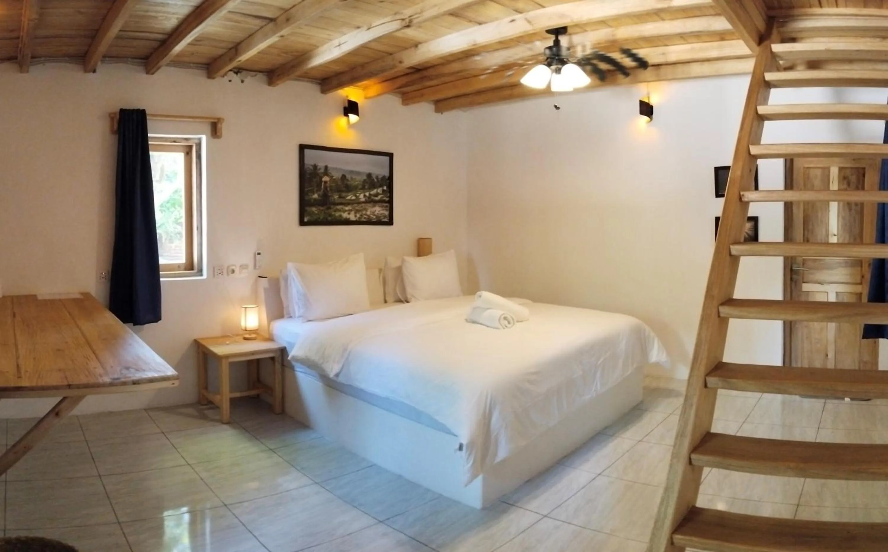 Bed in Blue Planet Dive Resort