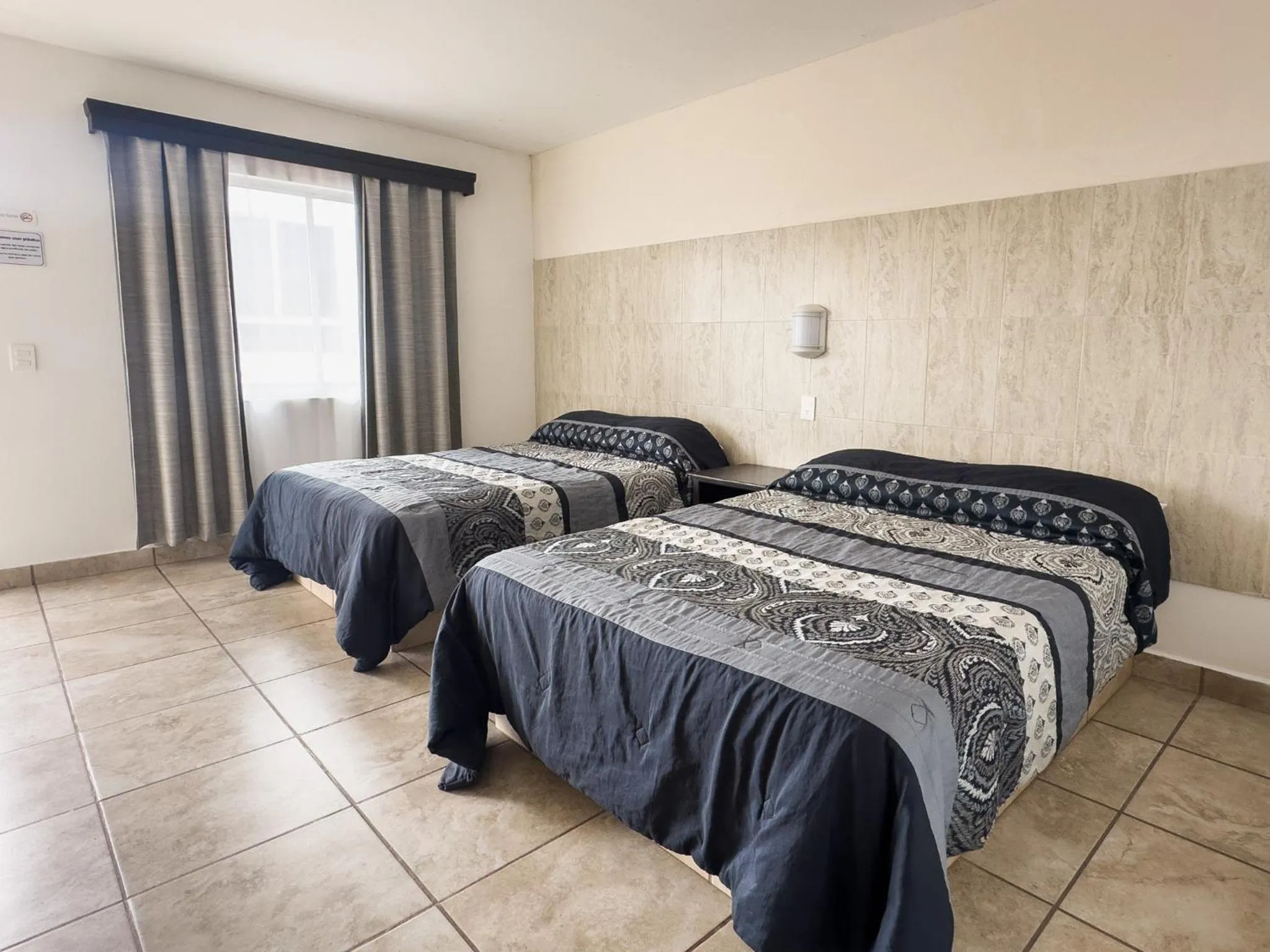 Bed in Eco Bay Hotel