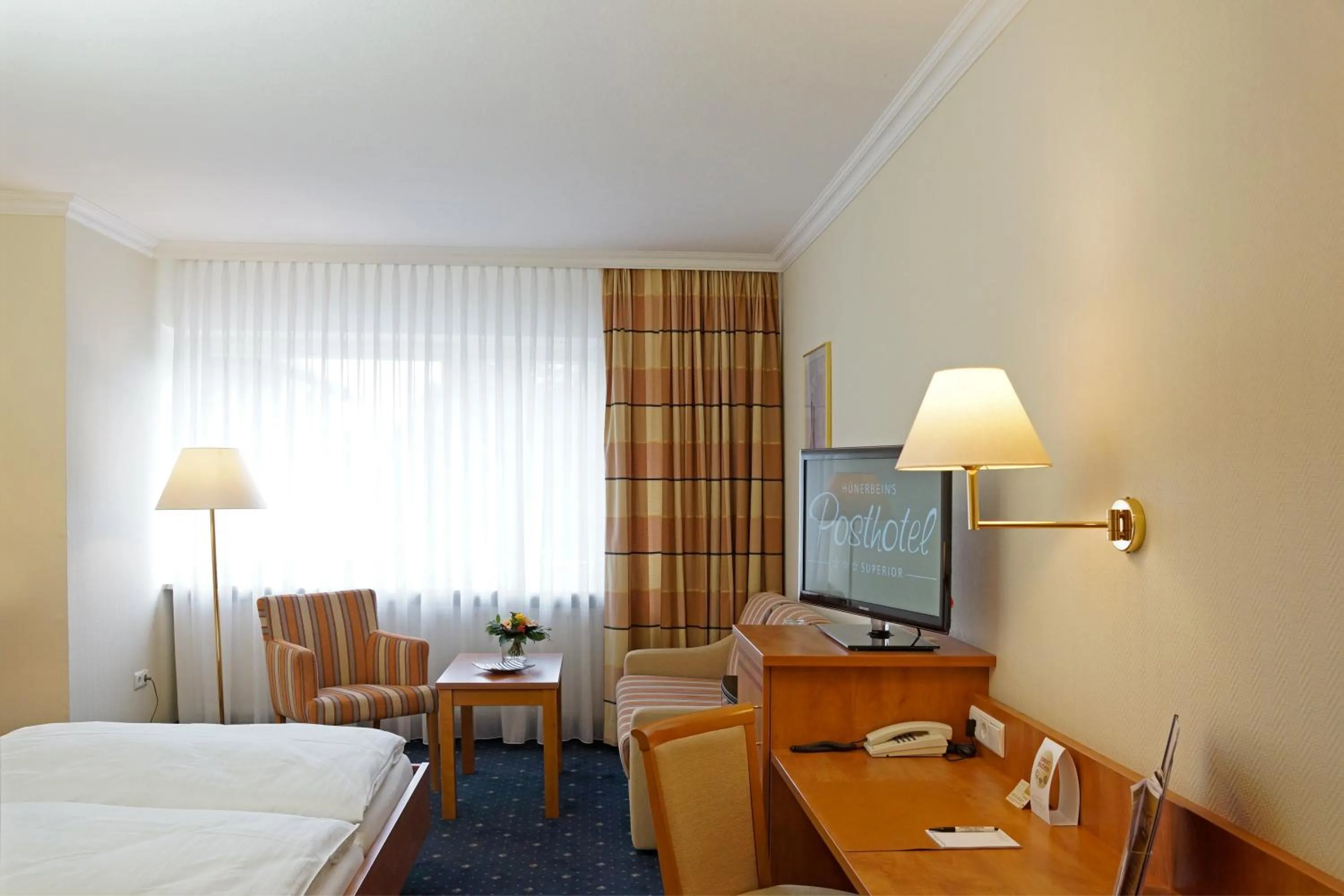 Photo of the whole room, Bed in Hünerbein's Posthotel